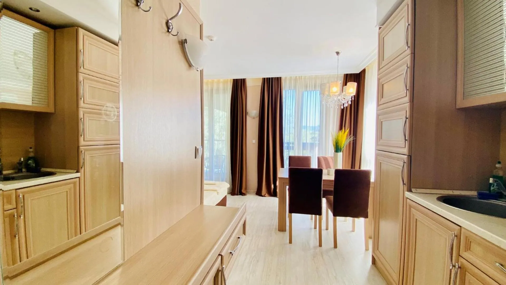 Kitchen or kitchenette in Bratanov Harmony Suites Dream Island Apartments