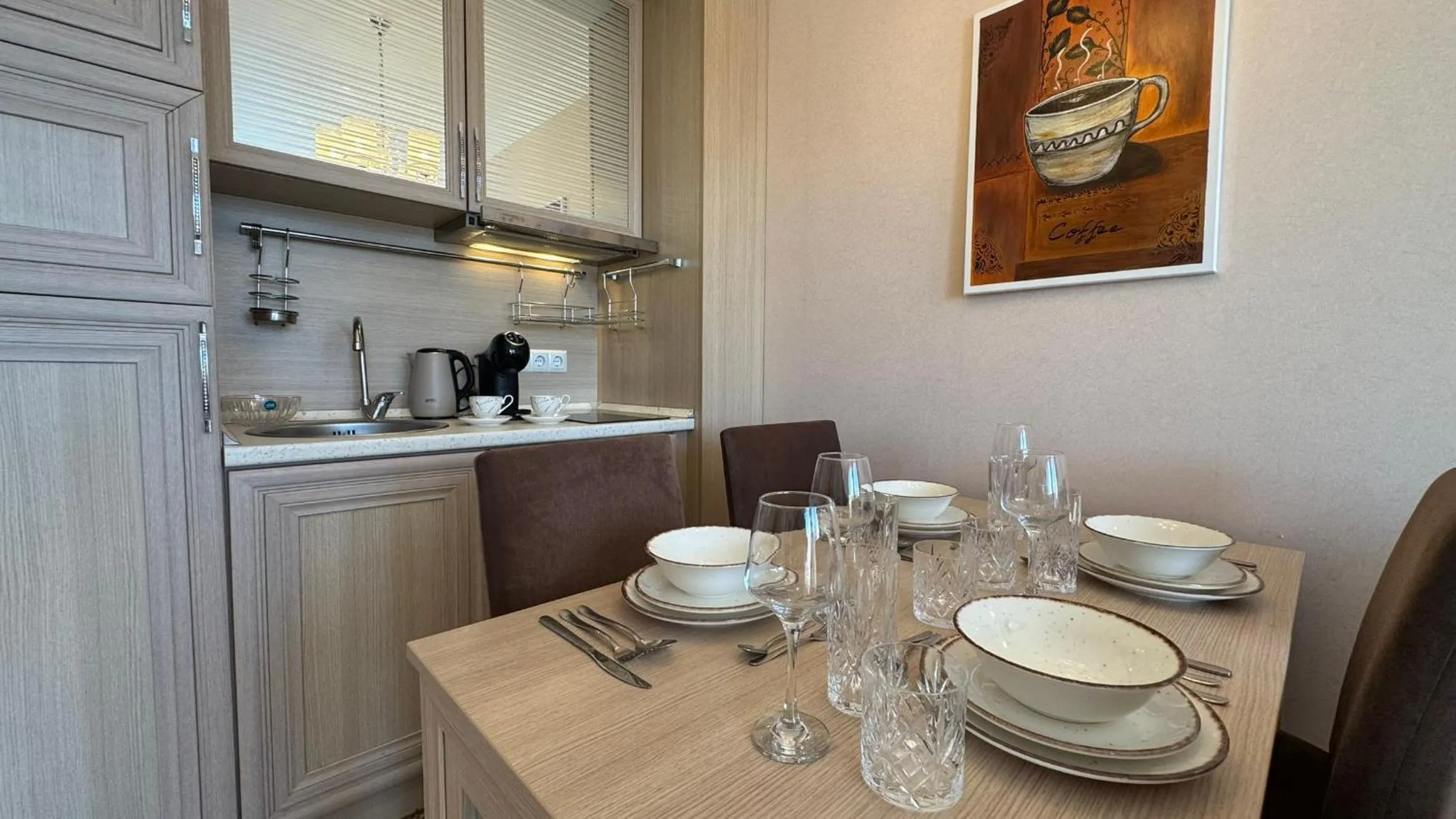 Kitchen or kitchenette in Bratanov Harmony Suites Dream Island Apartments