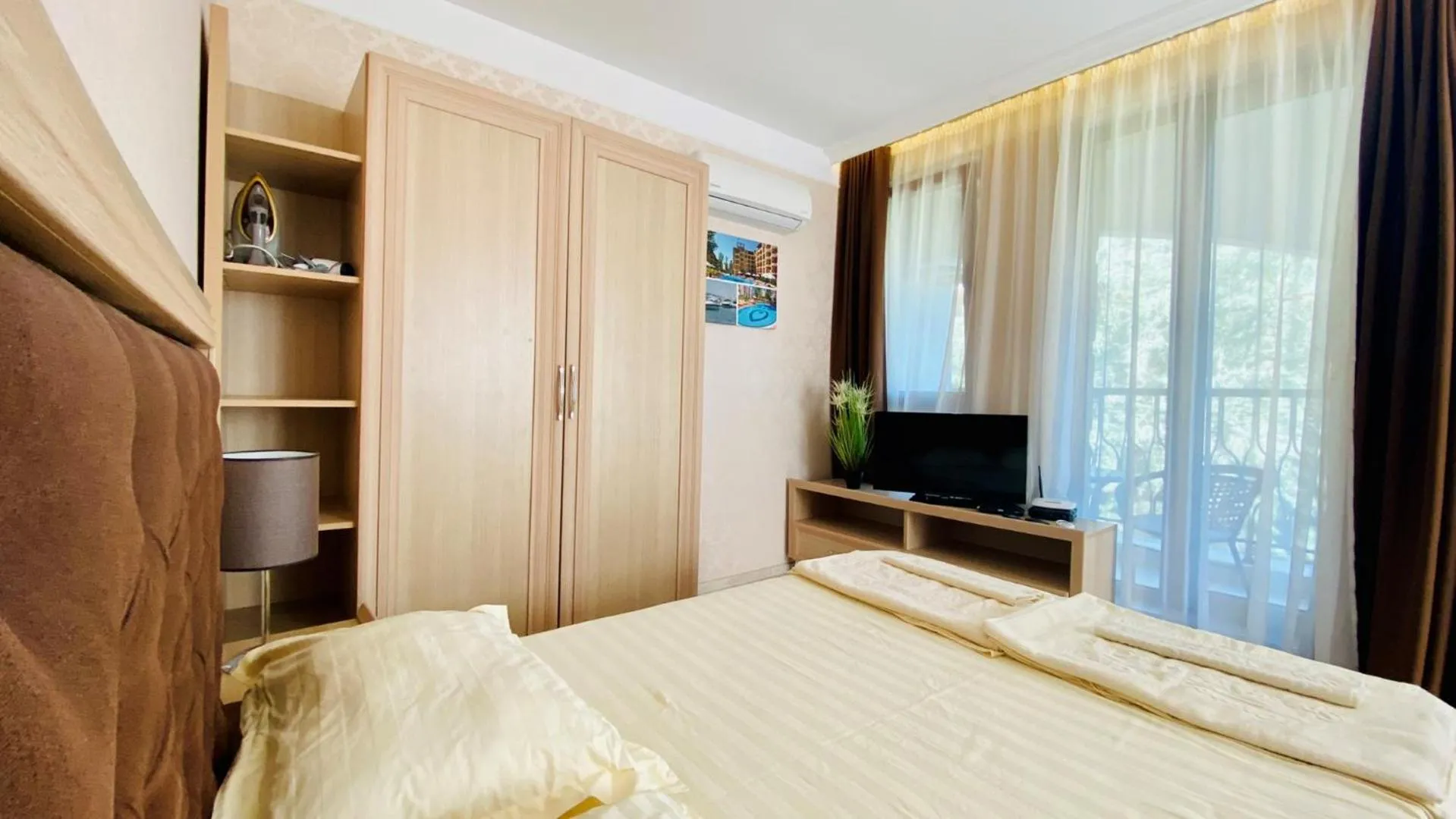Bed in Bratanov Harmony Suites Dream Island Apartments