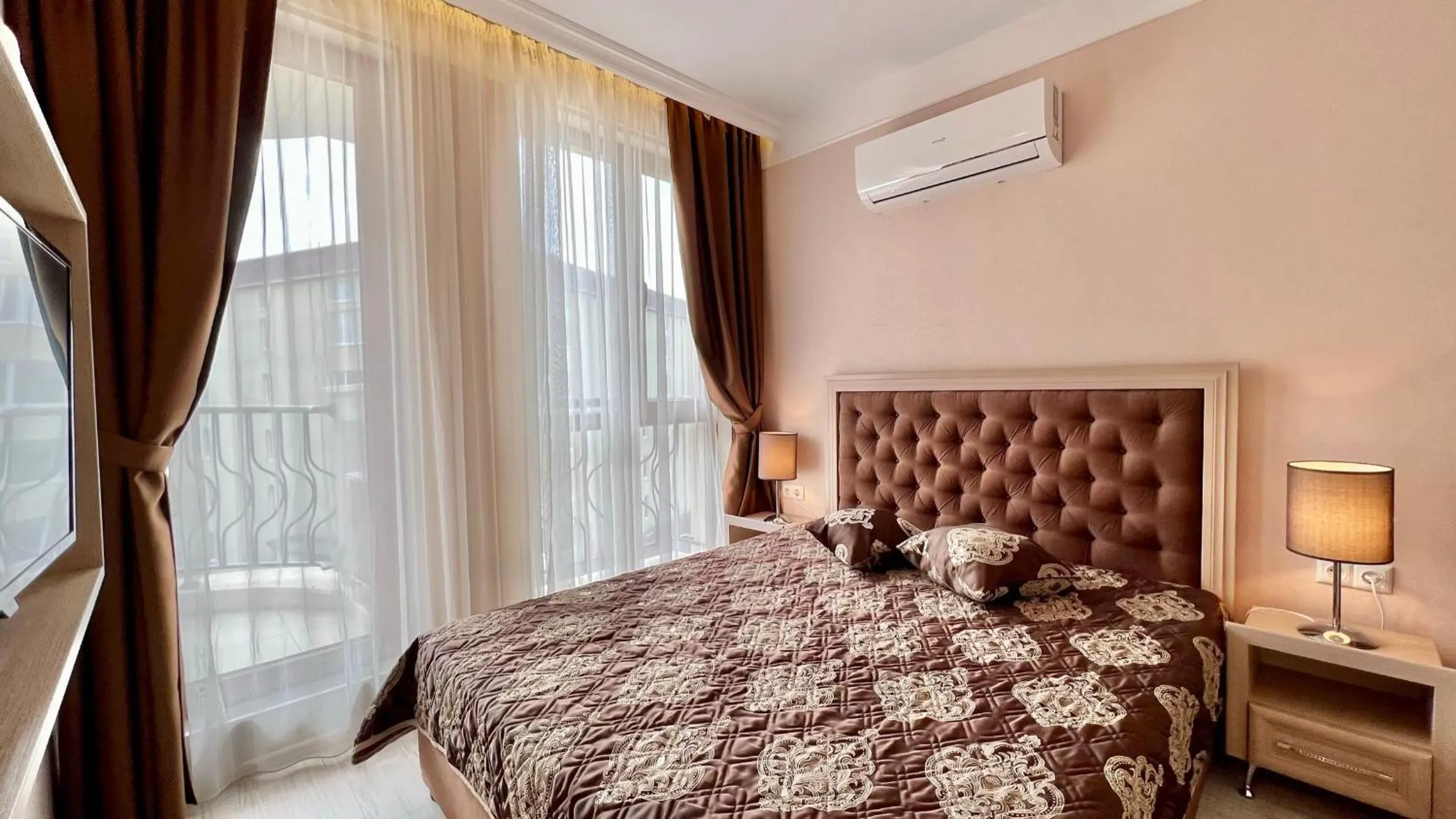 Bed in Bratanov Harmony Suites Dream Island Apartments