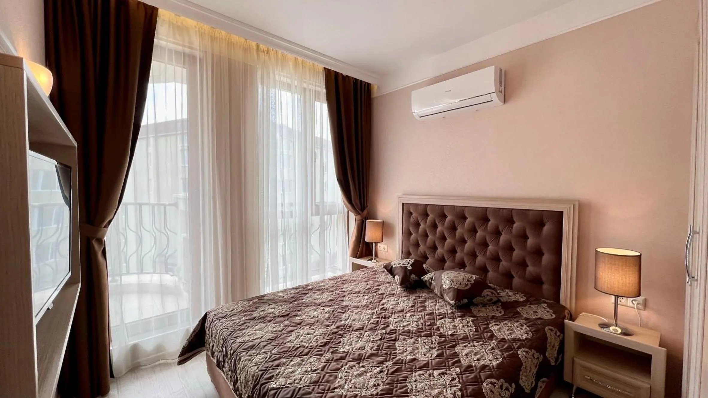 Bed in Bratanov Harmony Suites Dream Island Apartments