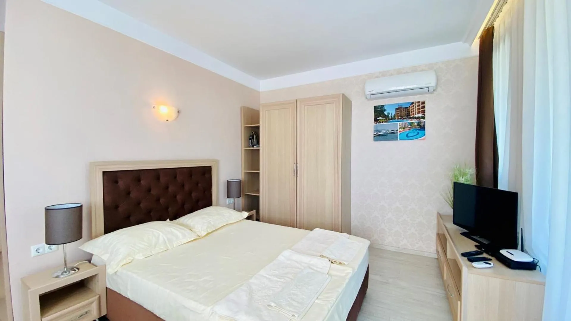 Bed in Bratanov Harmony Suites Dream Island Apartments