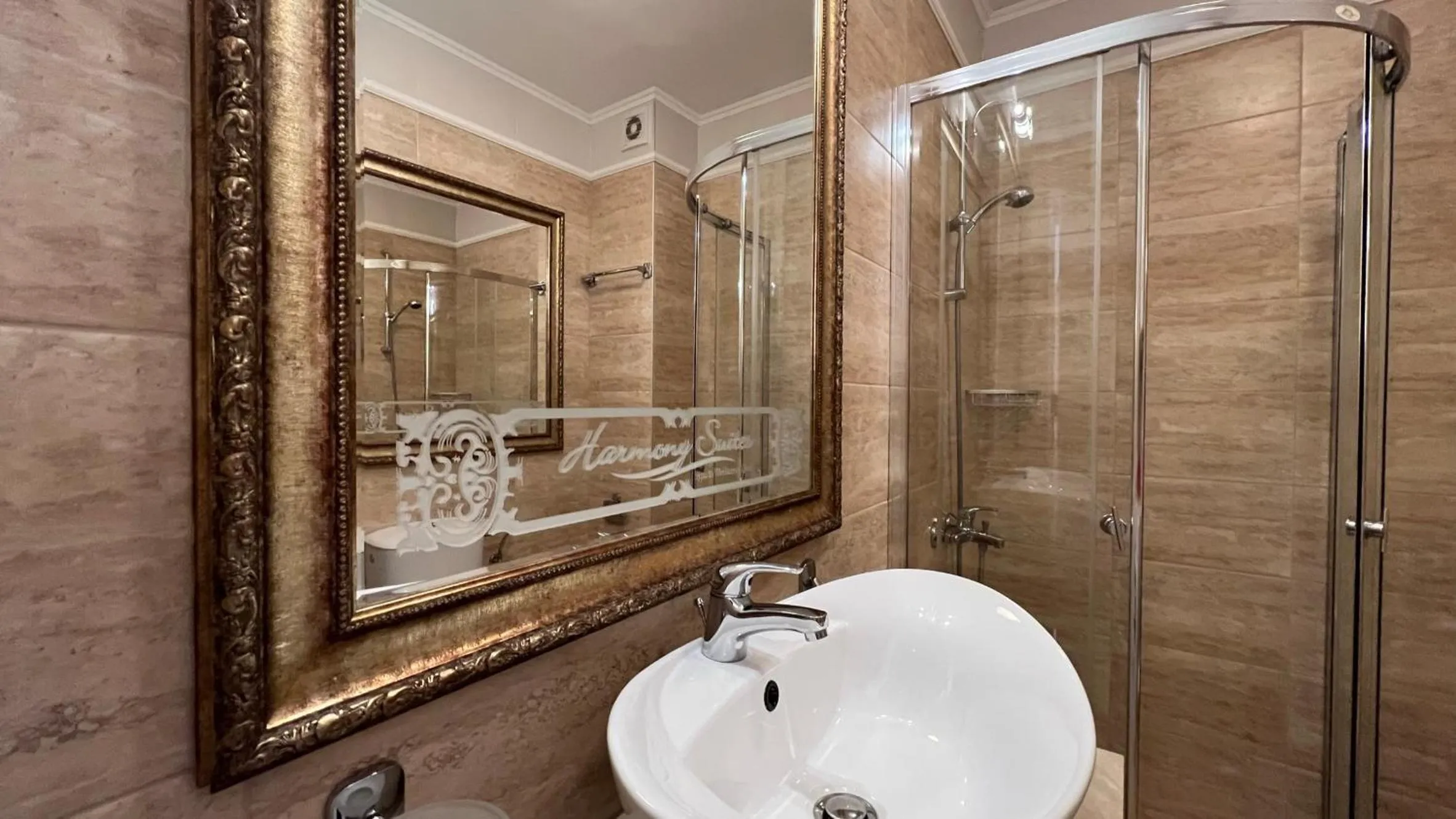 Shower in Bratanov Harmony Suites Dream Island Apartments