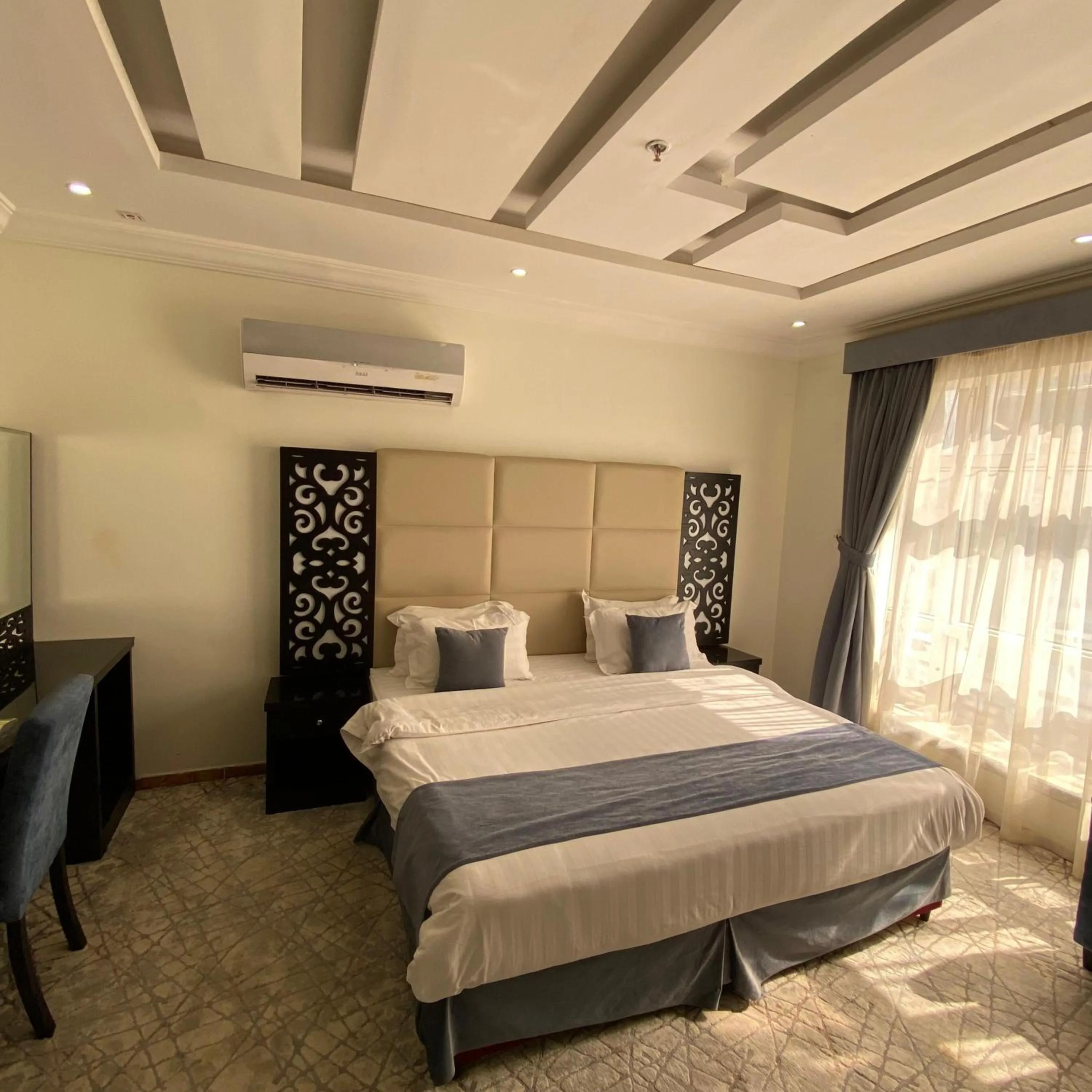 Bed in City Center Plaza Aparthotel