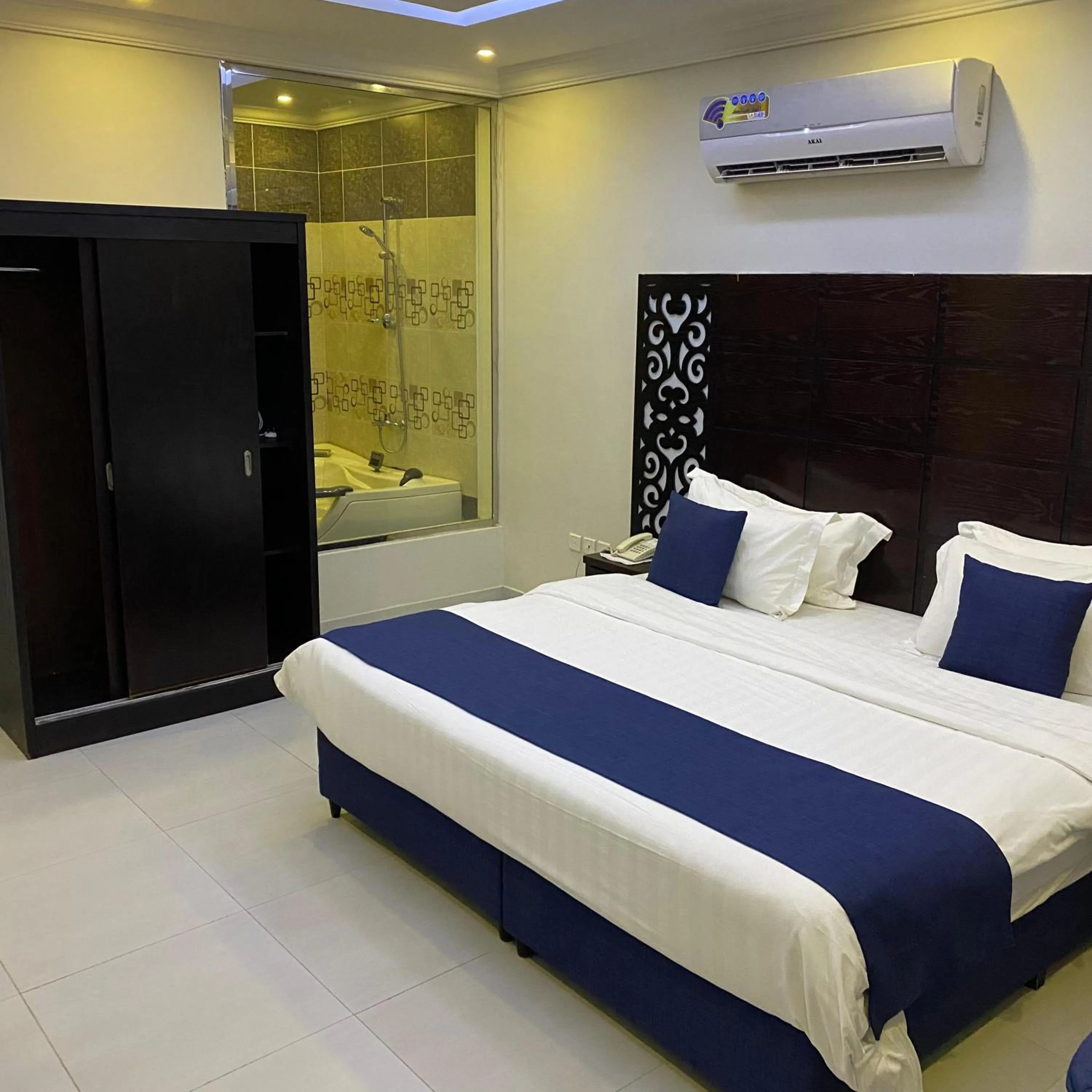 Bed in City Center Plaza Aparthotel