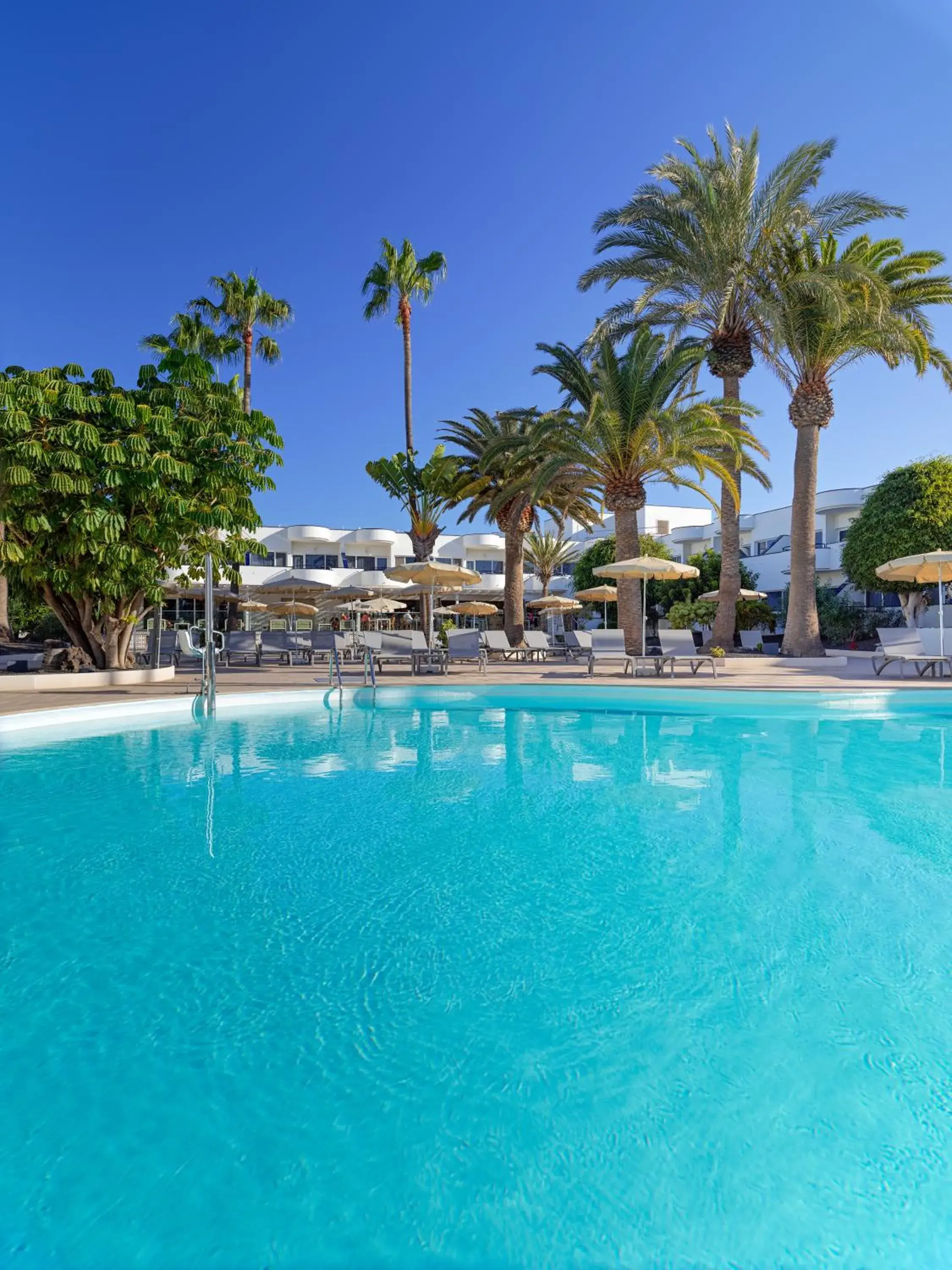 Swimming pool in H10 Ocean Dunas - Adults Only Swimming pool in H10 Ocean Dunas - Adults Only