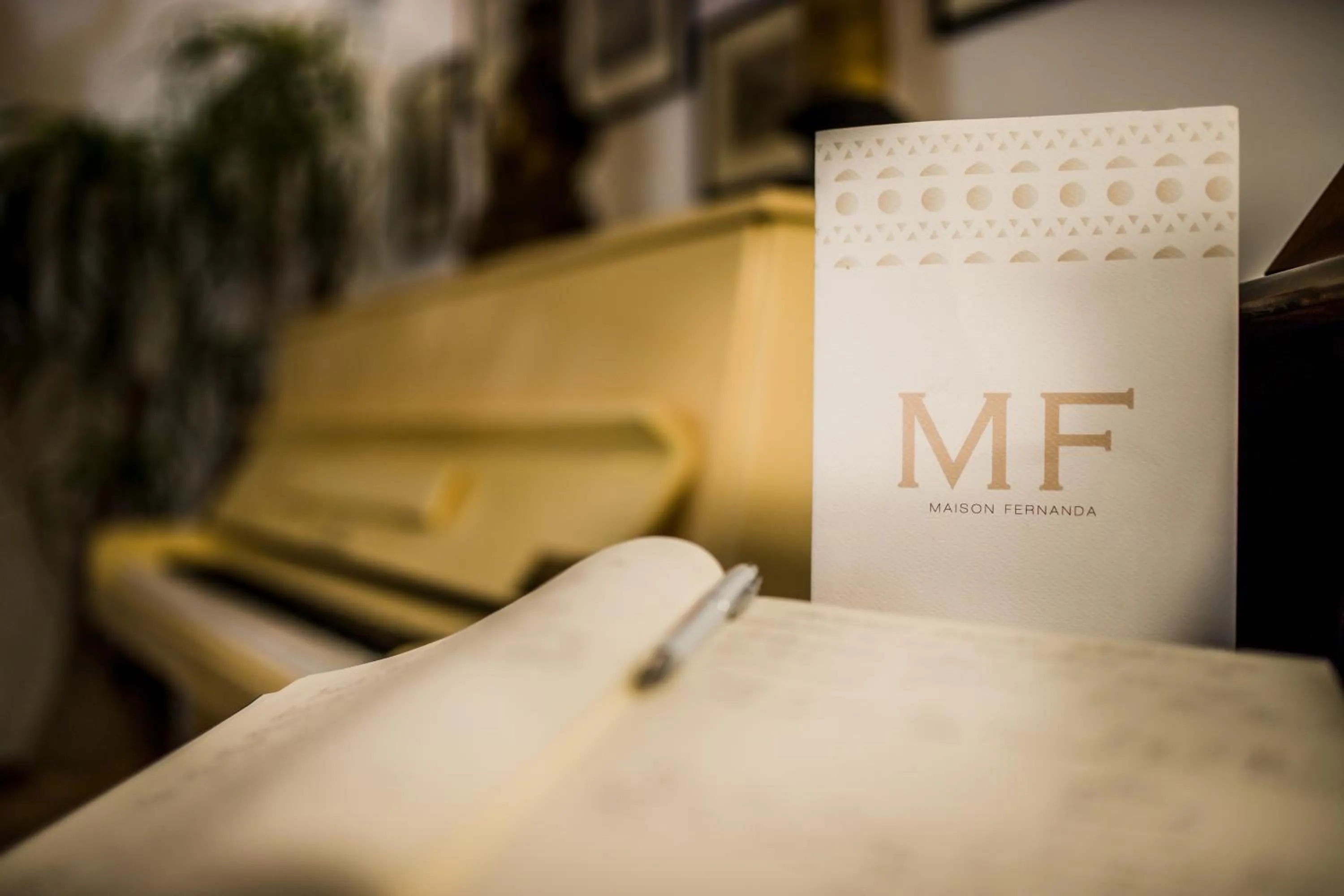 Property logo or sign, Bed in Maison Fernanda