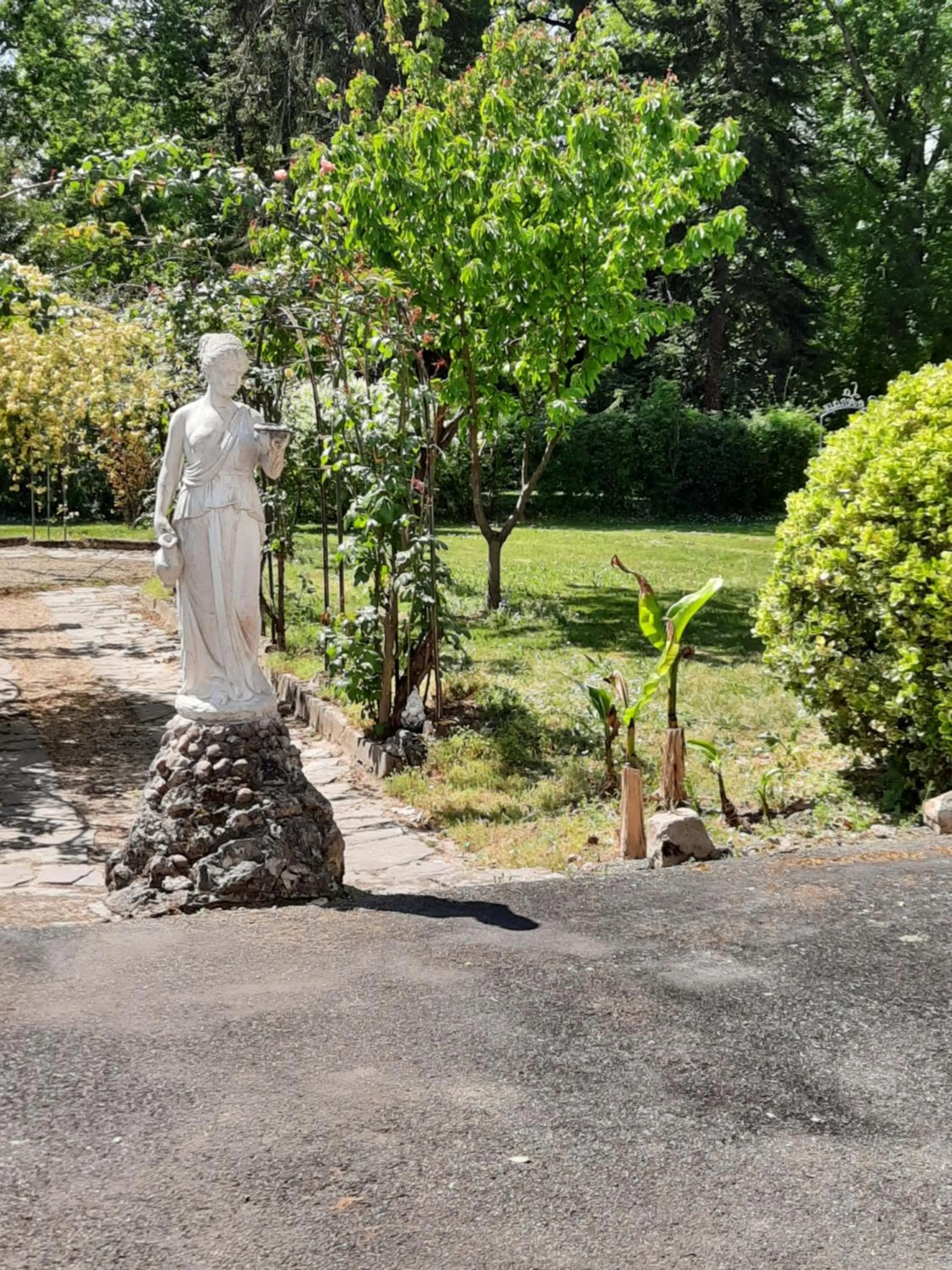 Garden view in Hostellerie de La Roseraie