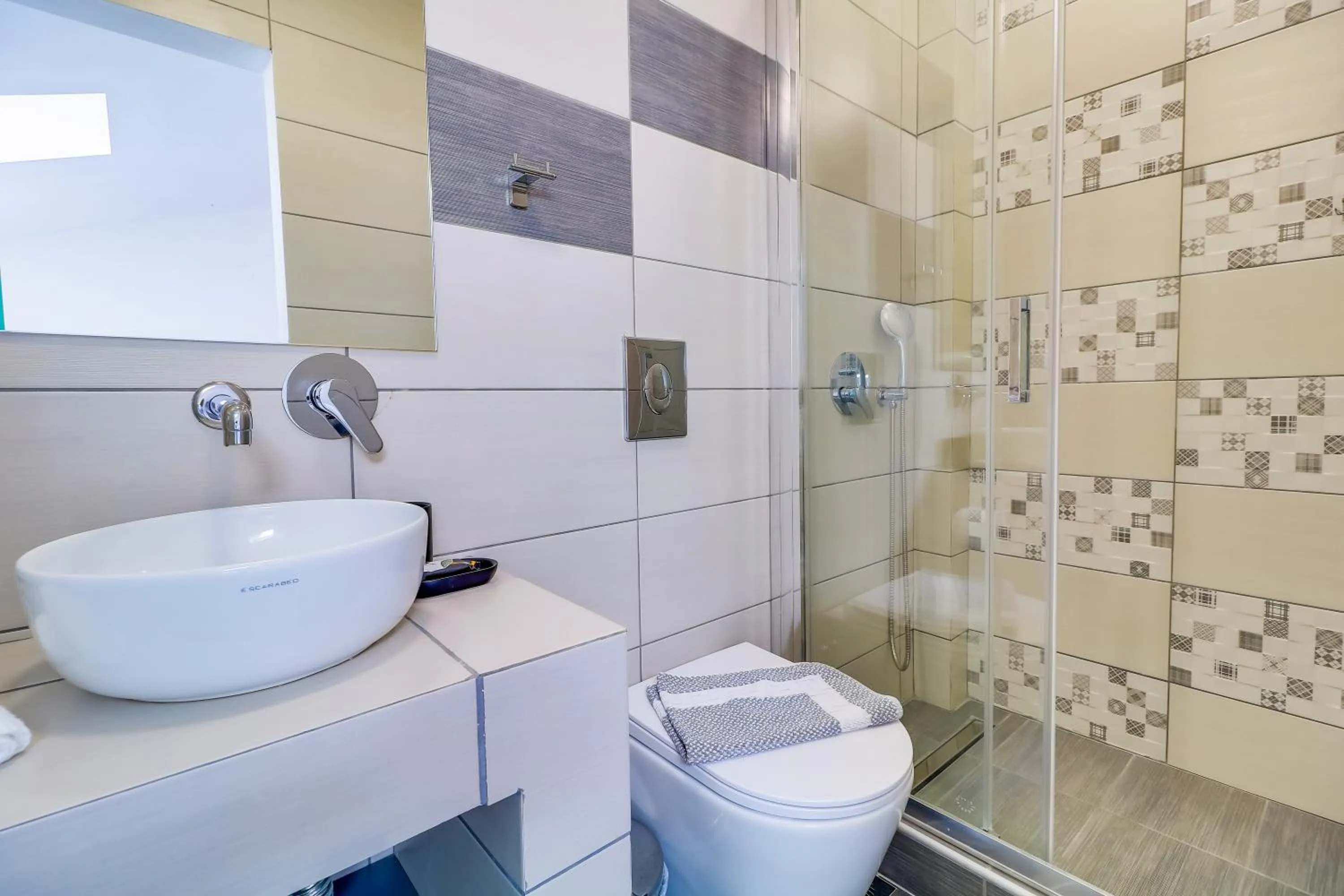 Bathroom in Theros Villas & Suites