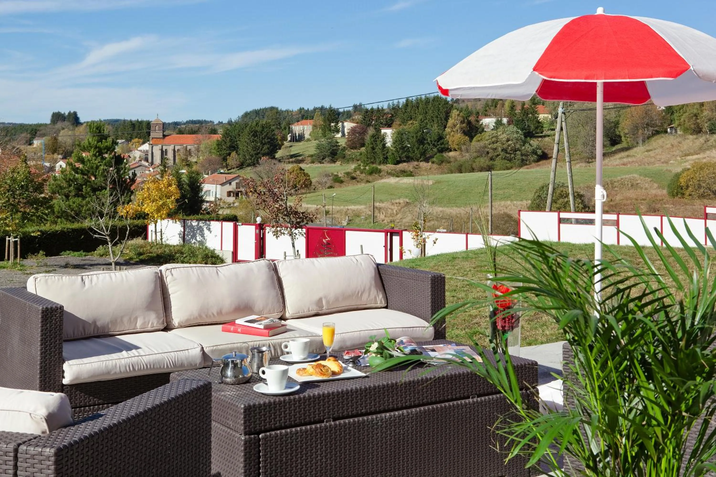 Patio in Logis Hotel Restaurant des Sapins