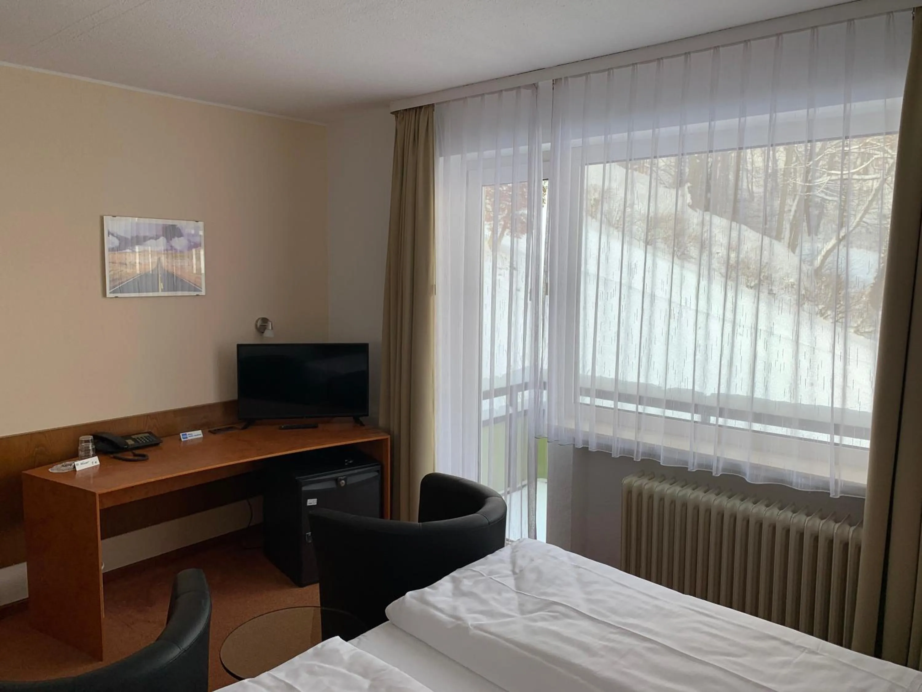TV and multimedia, Bed in Hotel Martina
