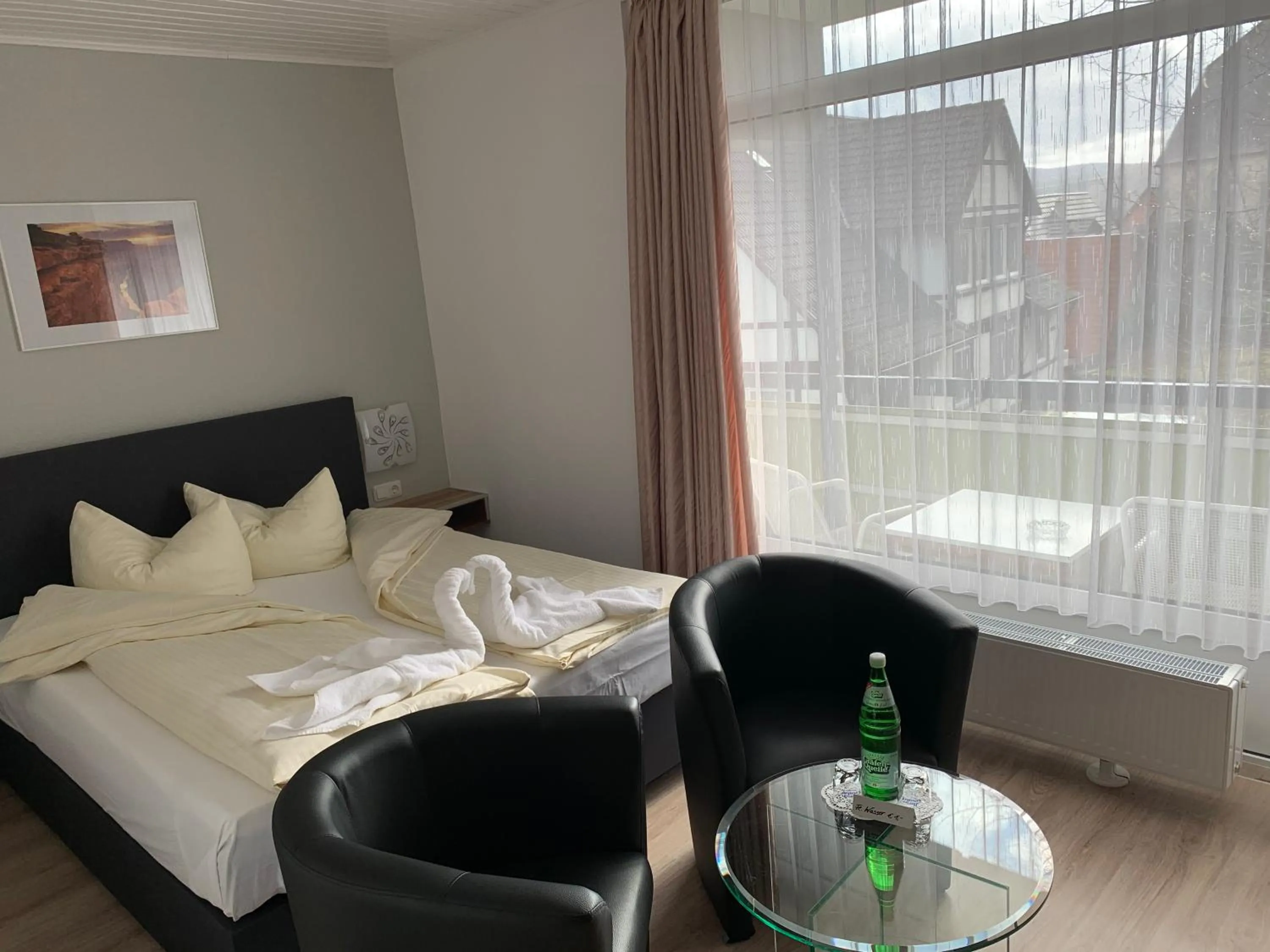 Seating area, Bed in Hotel Martina