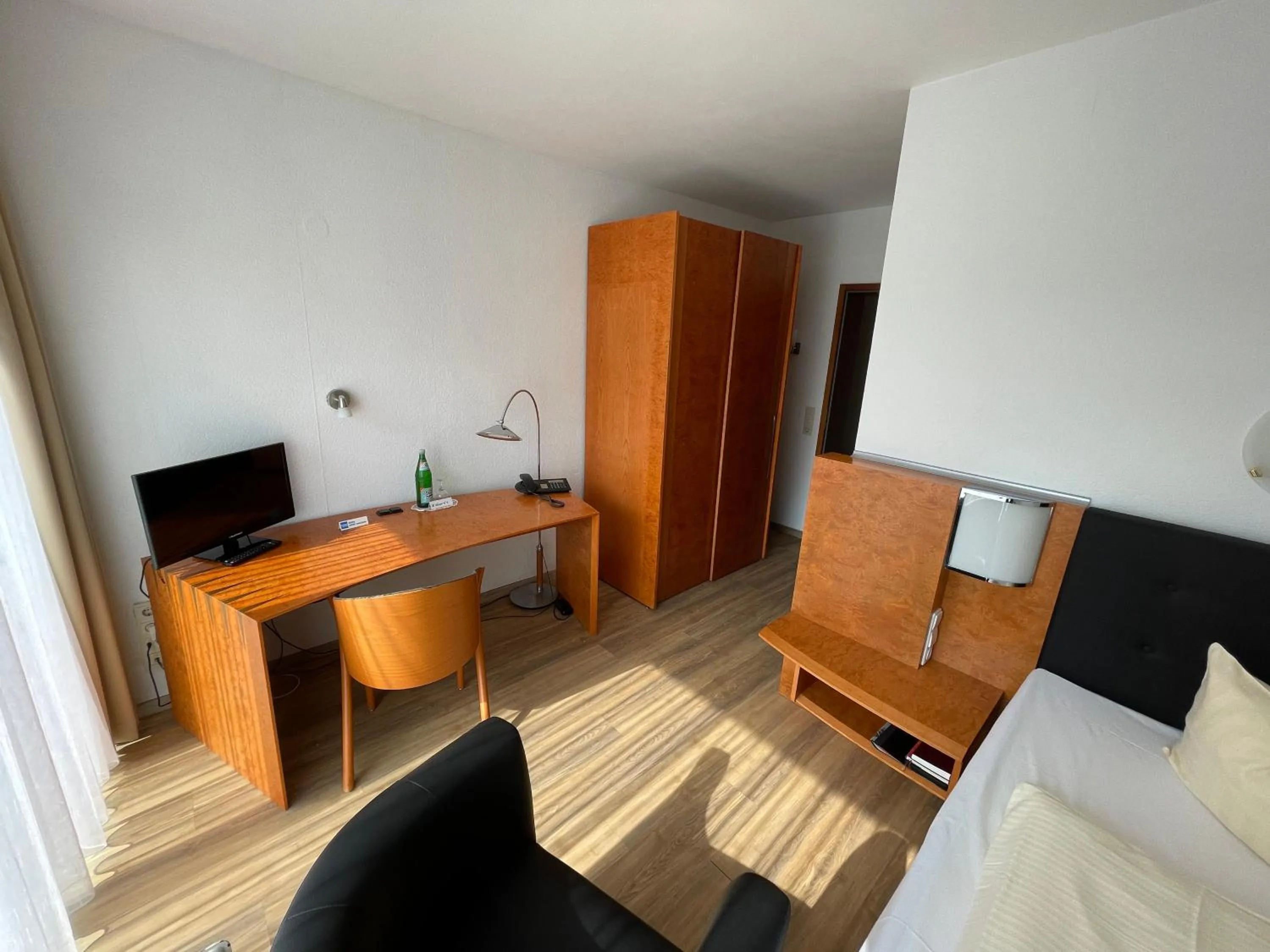 Seating area, Bed in Hotel Martina