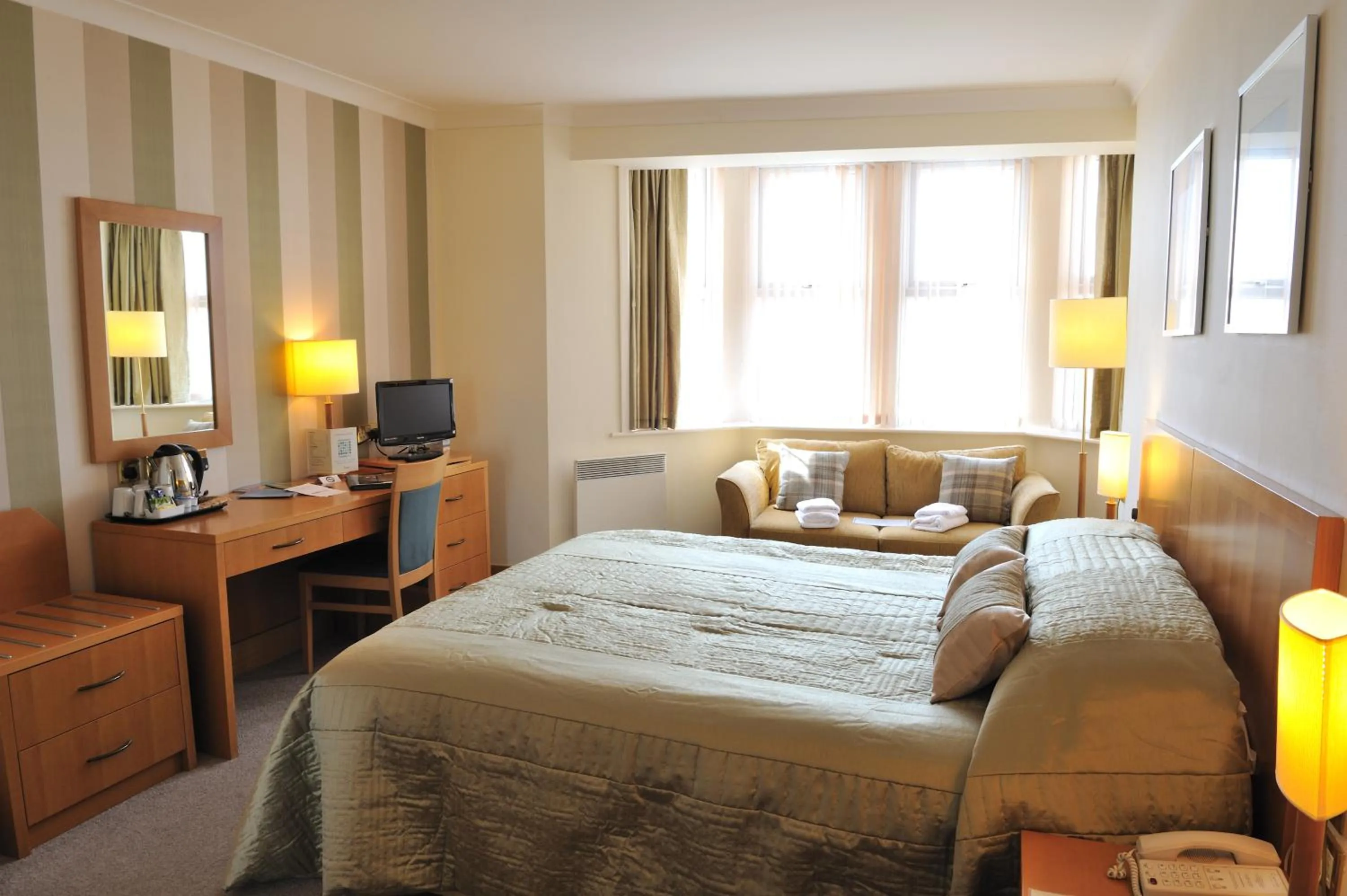 Bed in Carousel Hotel