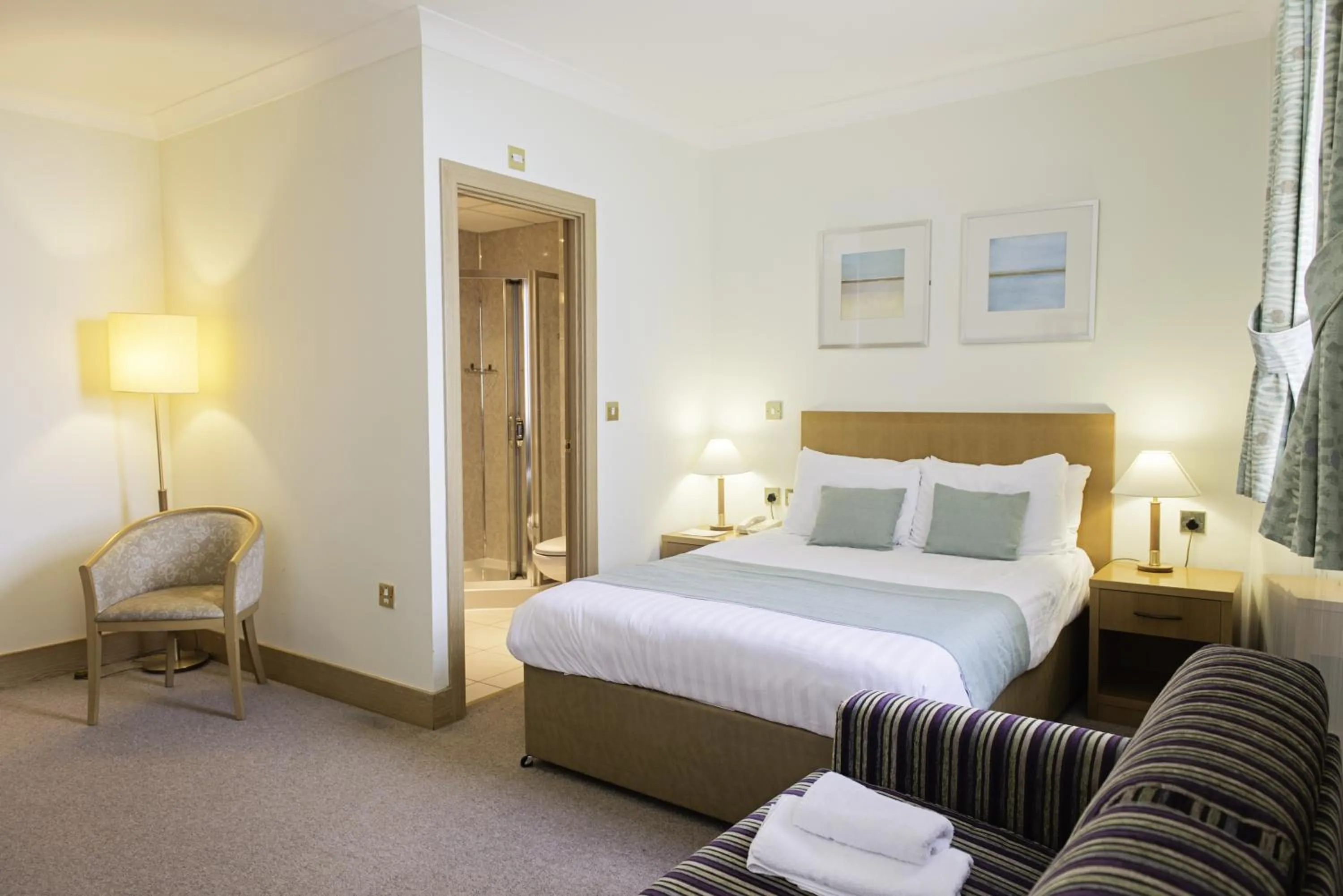 Bed in Carousel Hotel