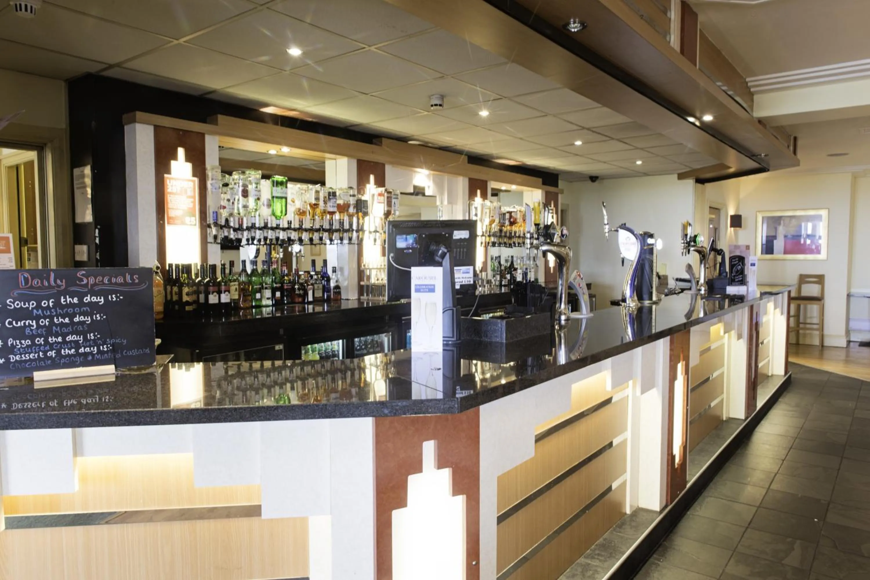 Lounge or bar in Carousel Hotel