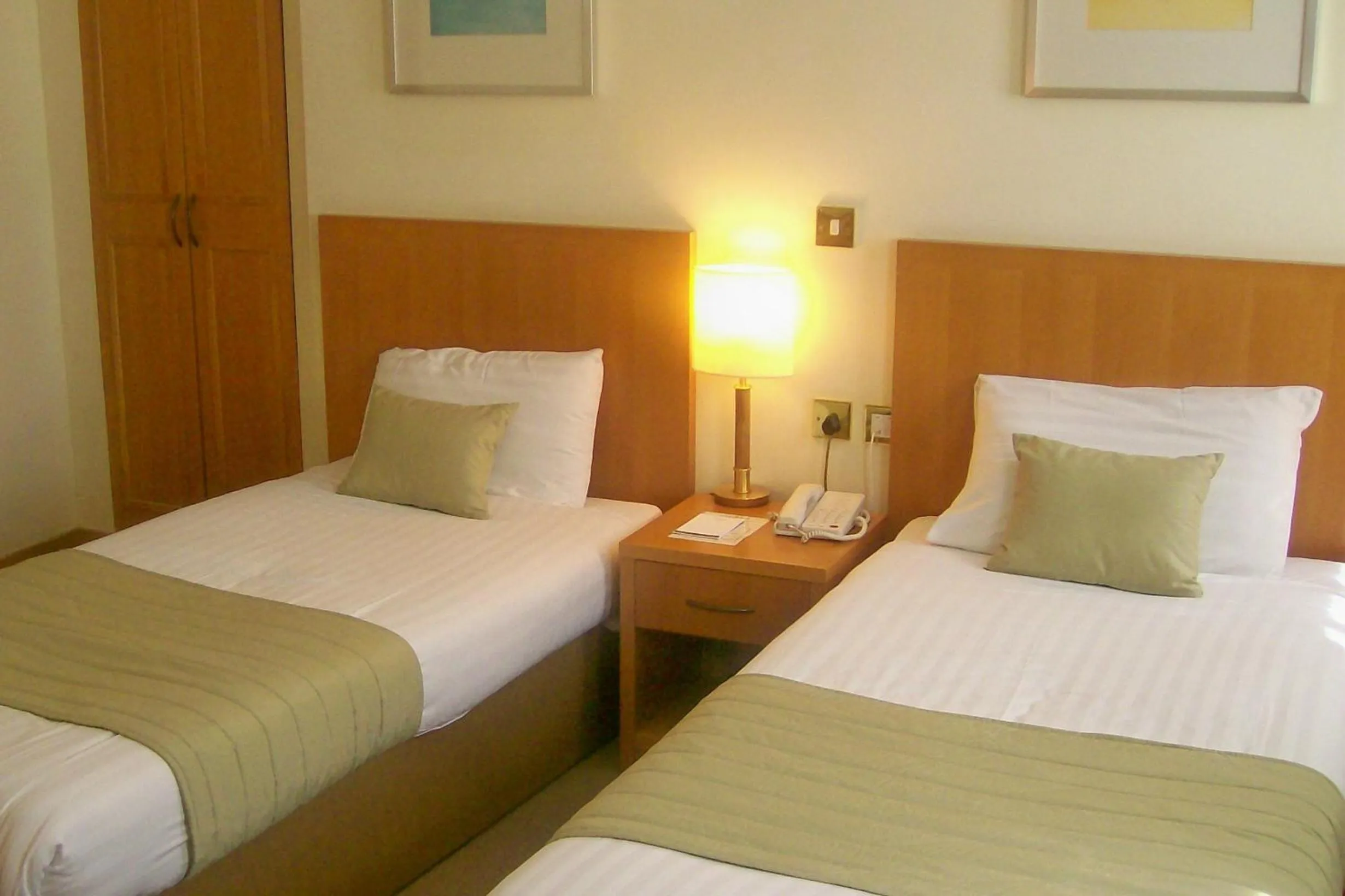 Bed in Carousel Hotel