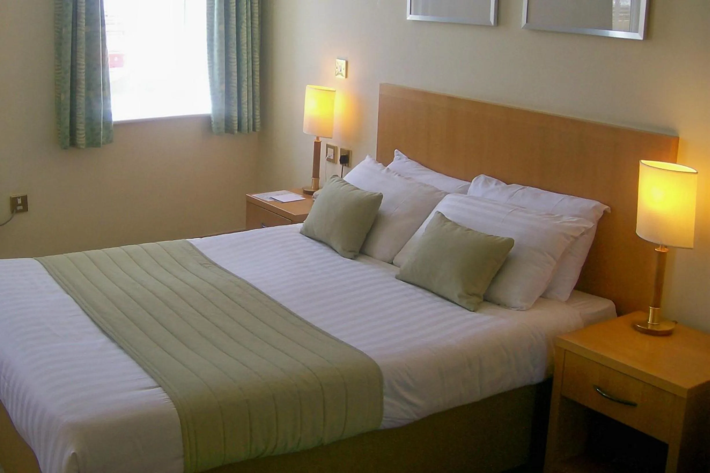 Bed in Carousel Hotel