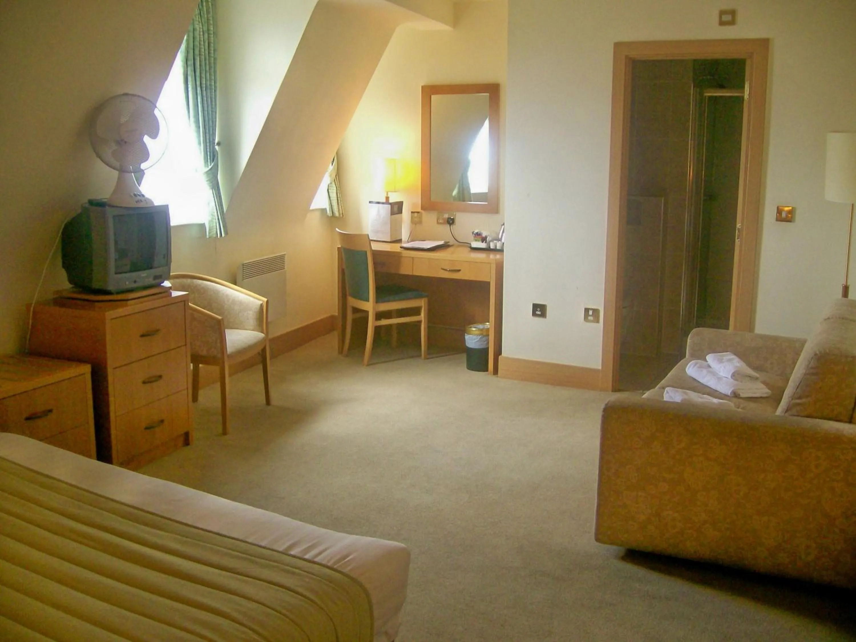 Bed in Carousel Hotel