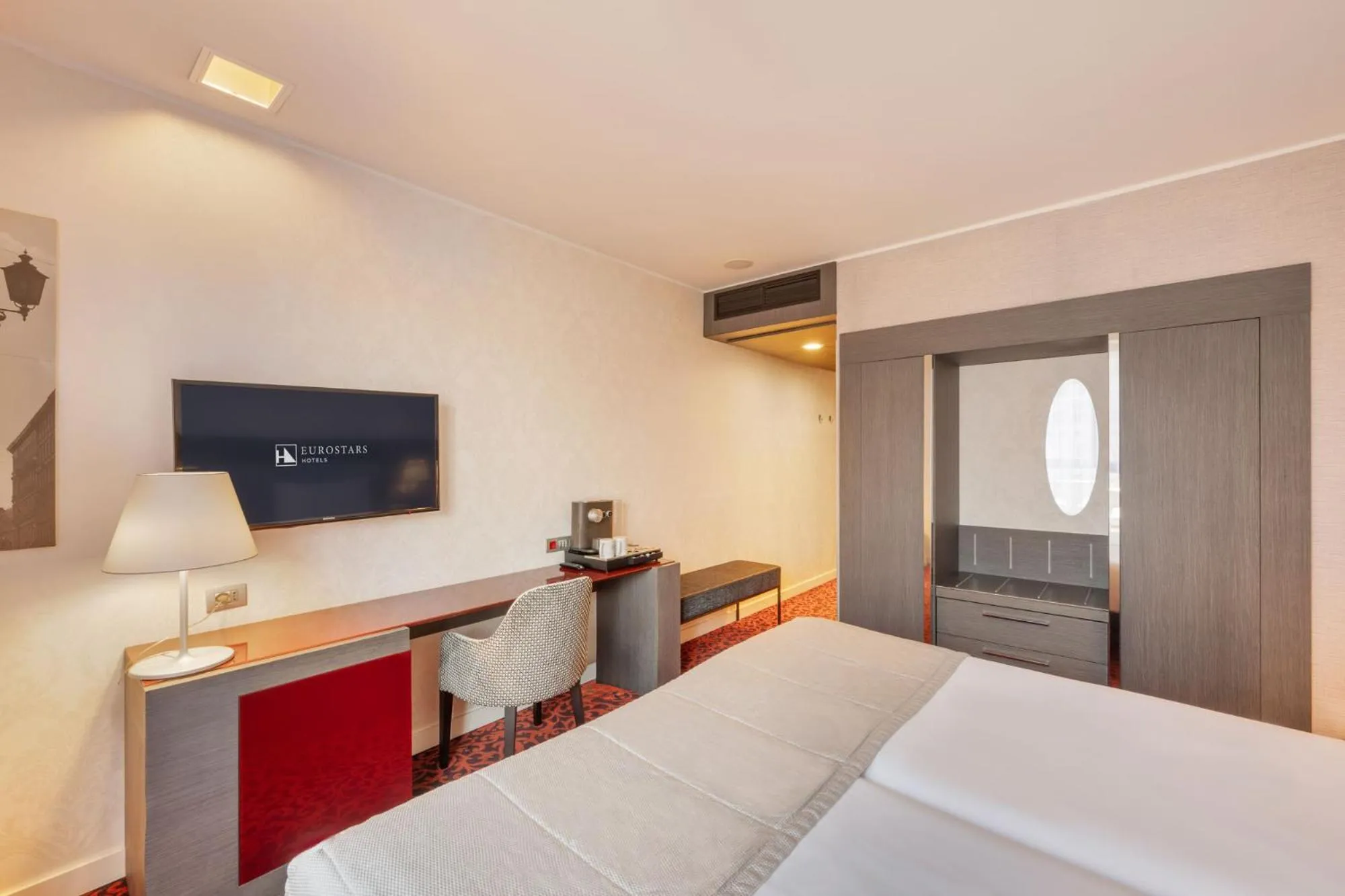 Bed in Eurostars Palazzo Zichy