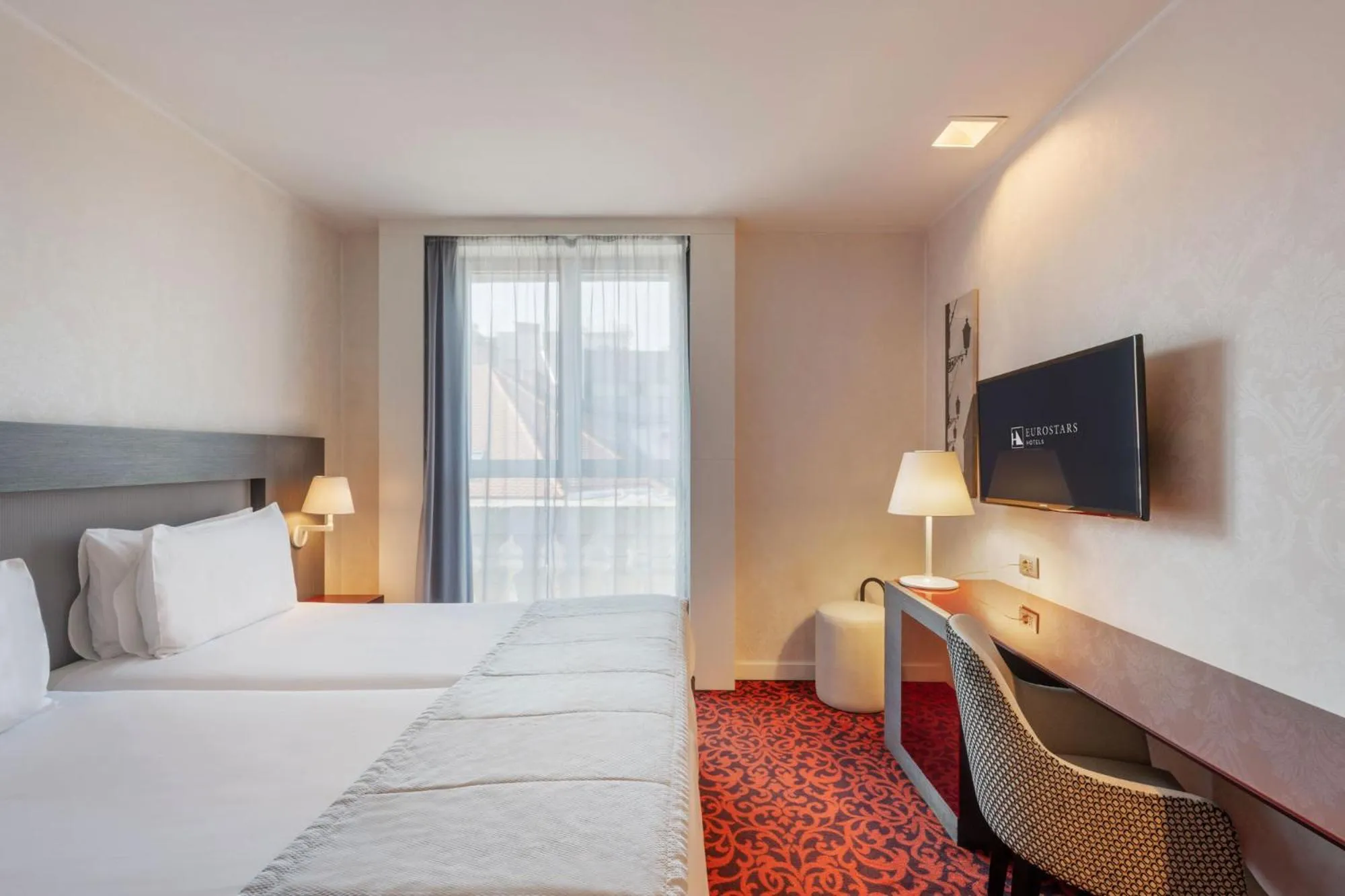 Bed in Eurostars Palazzo Zichy