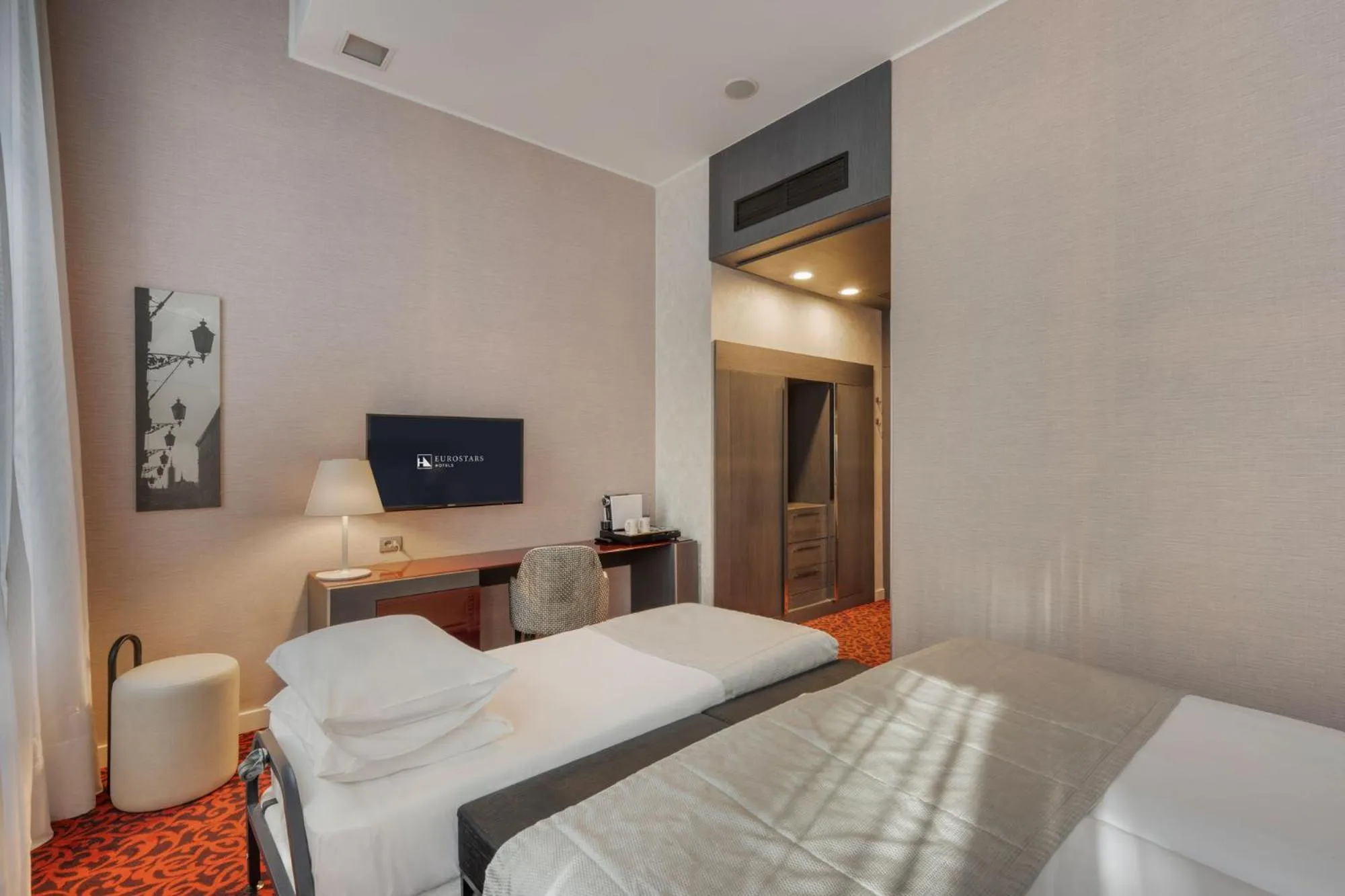 Bed in Eurostars Palazzo Zichy