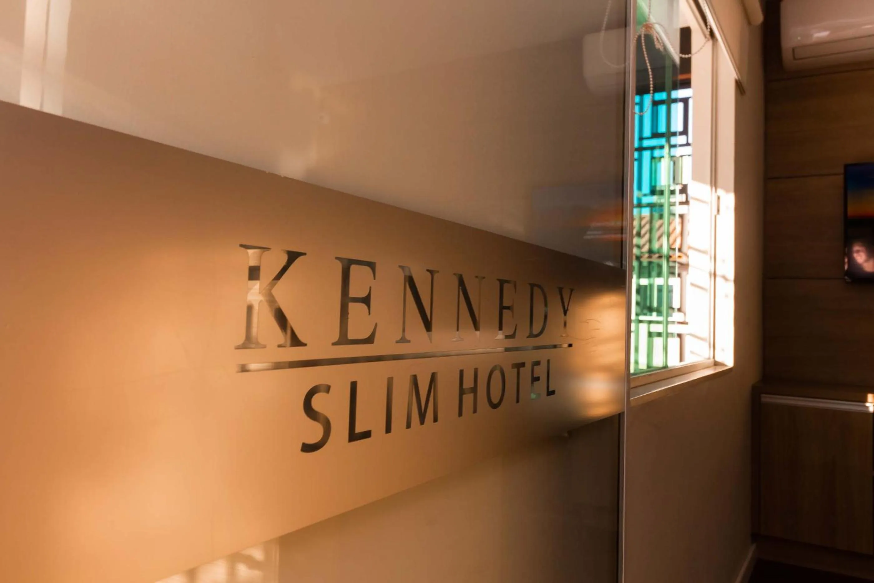 Property logo or sign in Kennedy Slim Hotel