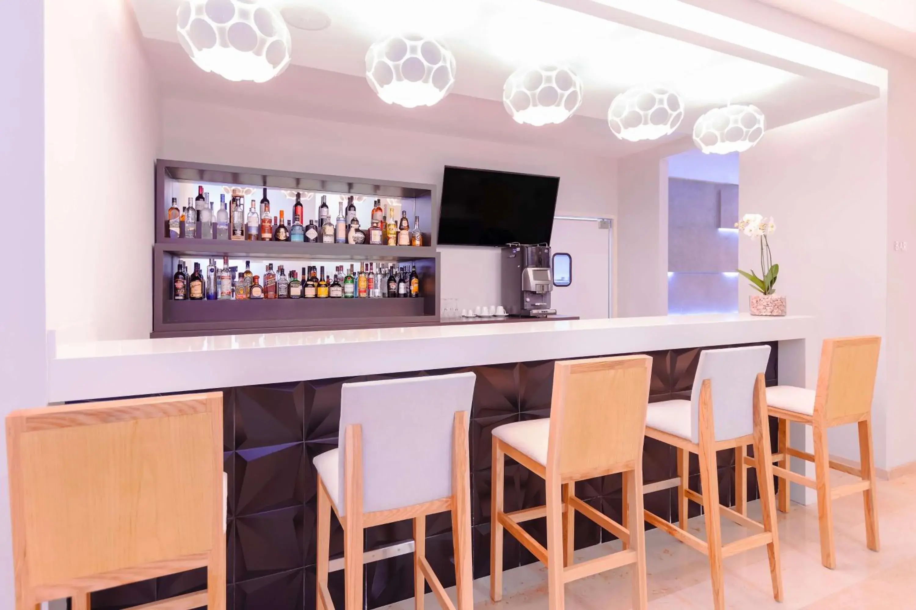 Lounge or bar in NH Puebla FINSA Lounge or bar in NH Puebla FINSA