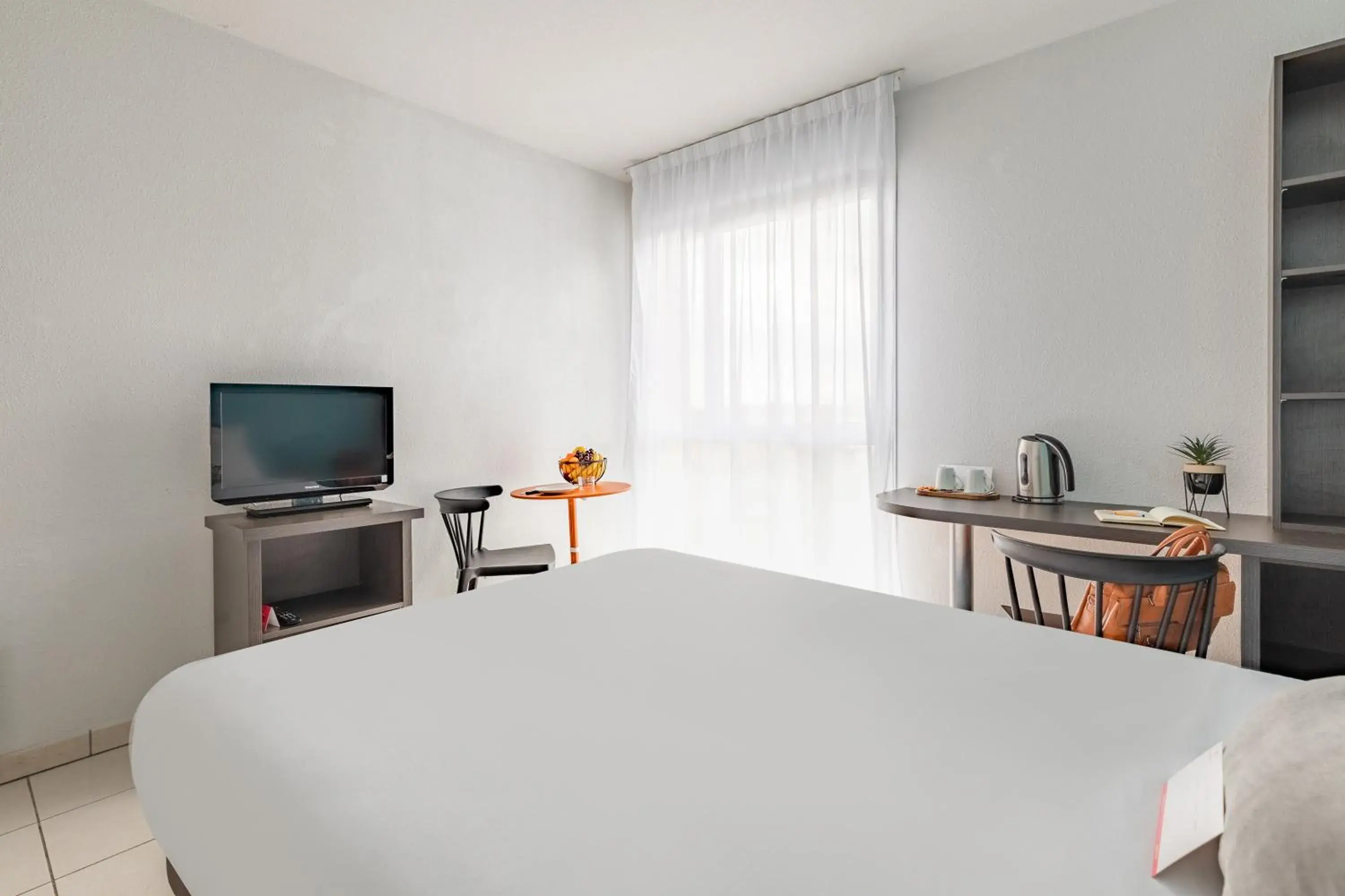 Bedroom, Bed in Appart'City Classic Toulouse Tournefeuille Bedroom, Bed in Appart'City Classic Toulouse Tournefeuille