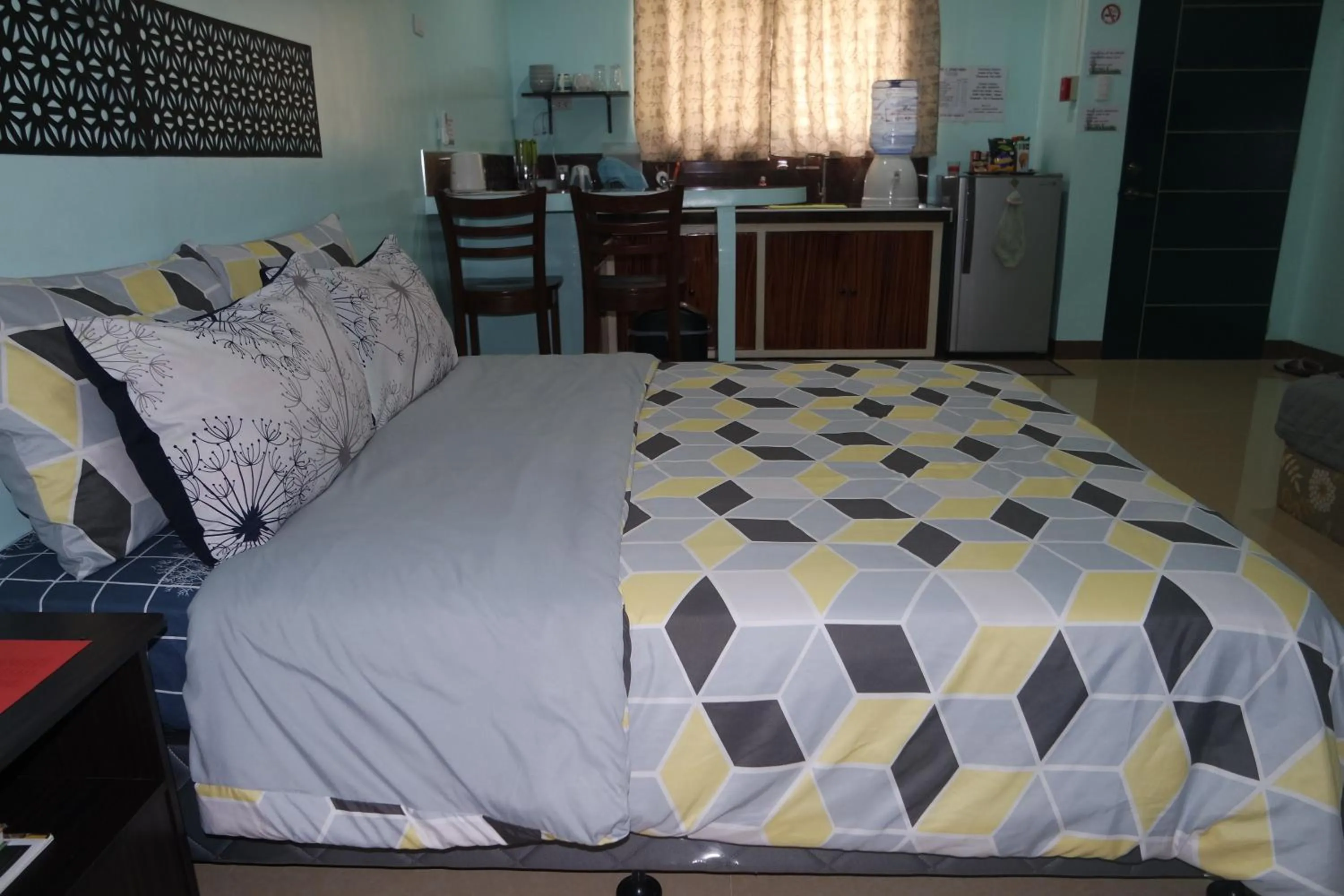 Bed in Yoo C Apartment