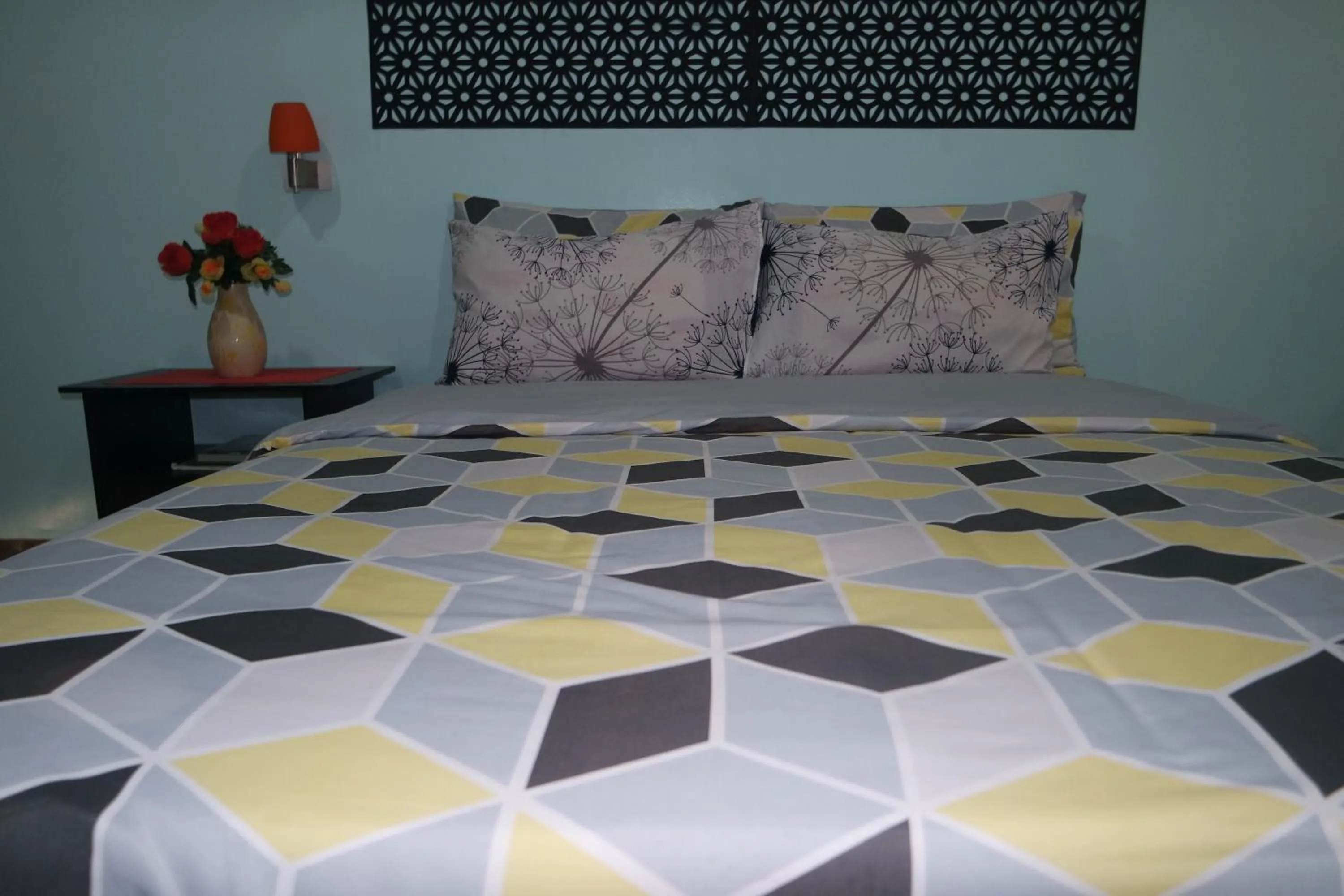 Bed in Yoo C Apartment