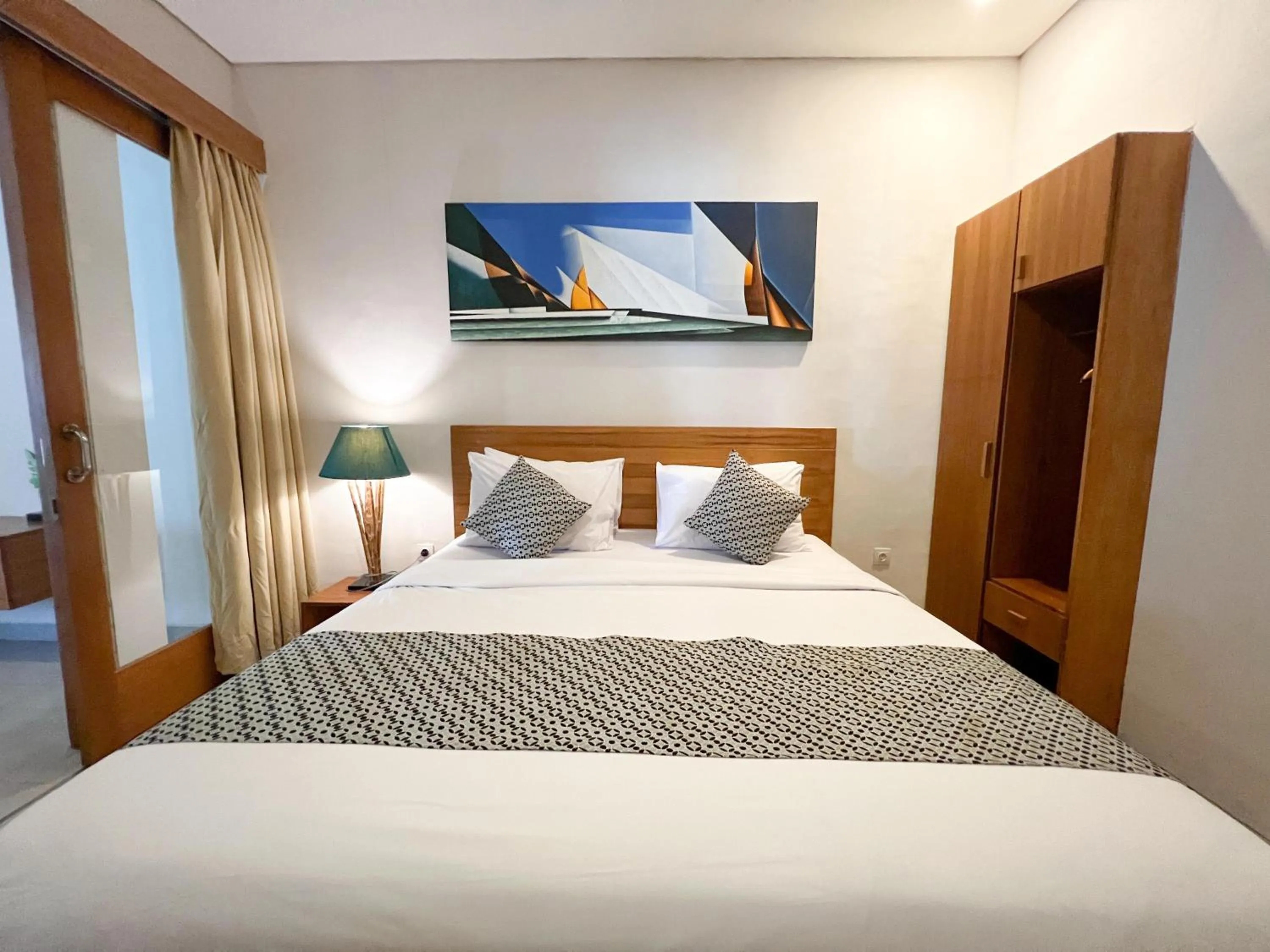 Bed in Apple Villa & Suite Seminyak