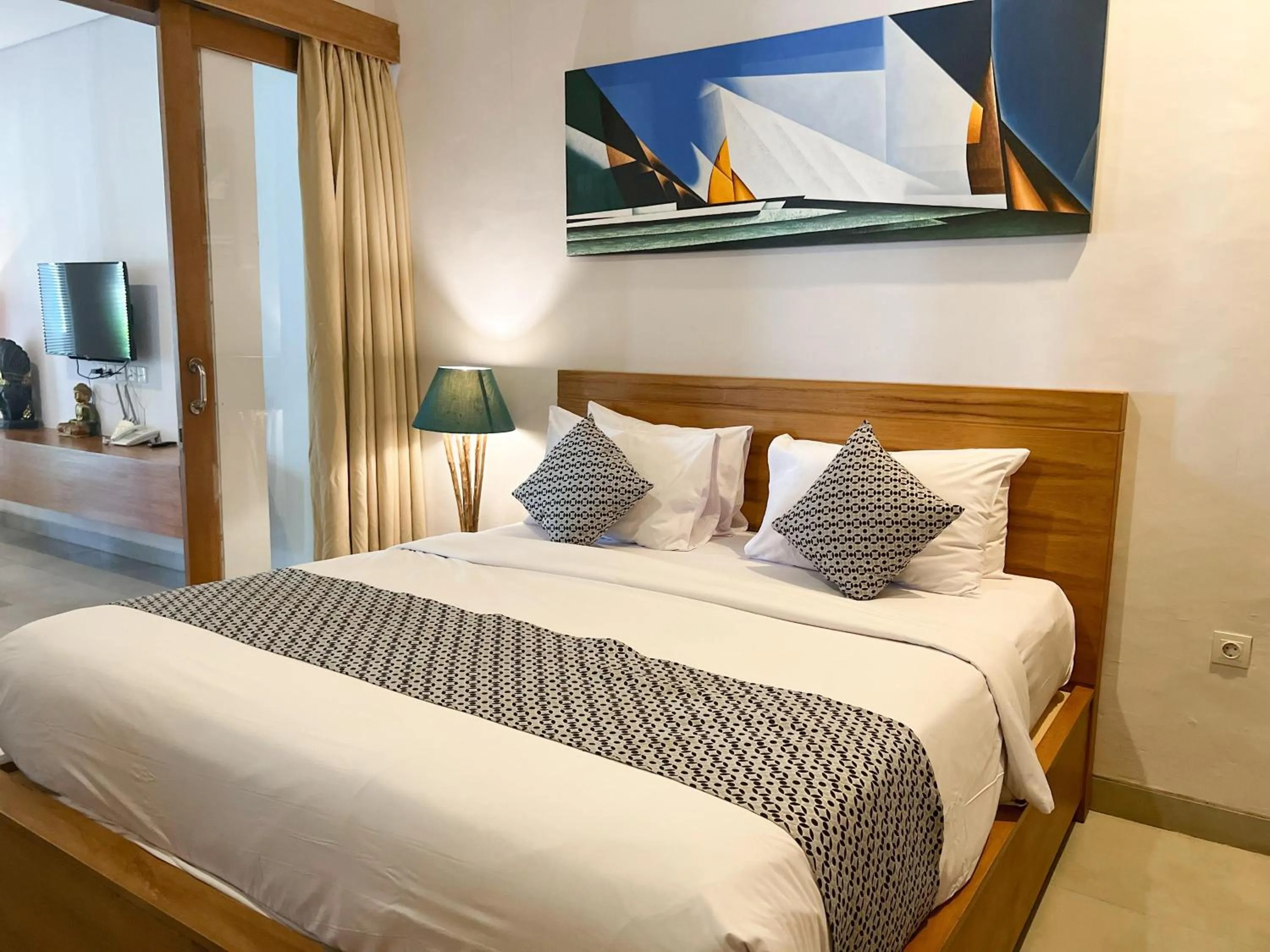 Bed in Apple Villa & Suite Seminyak