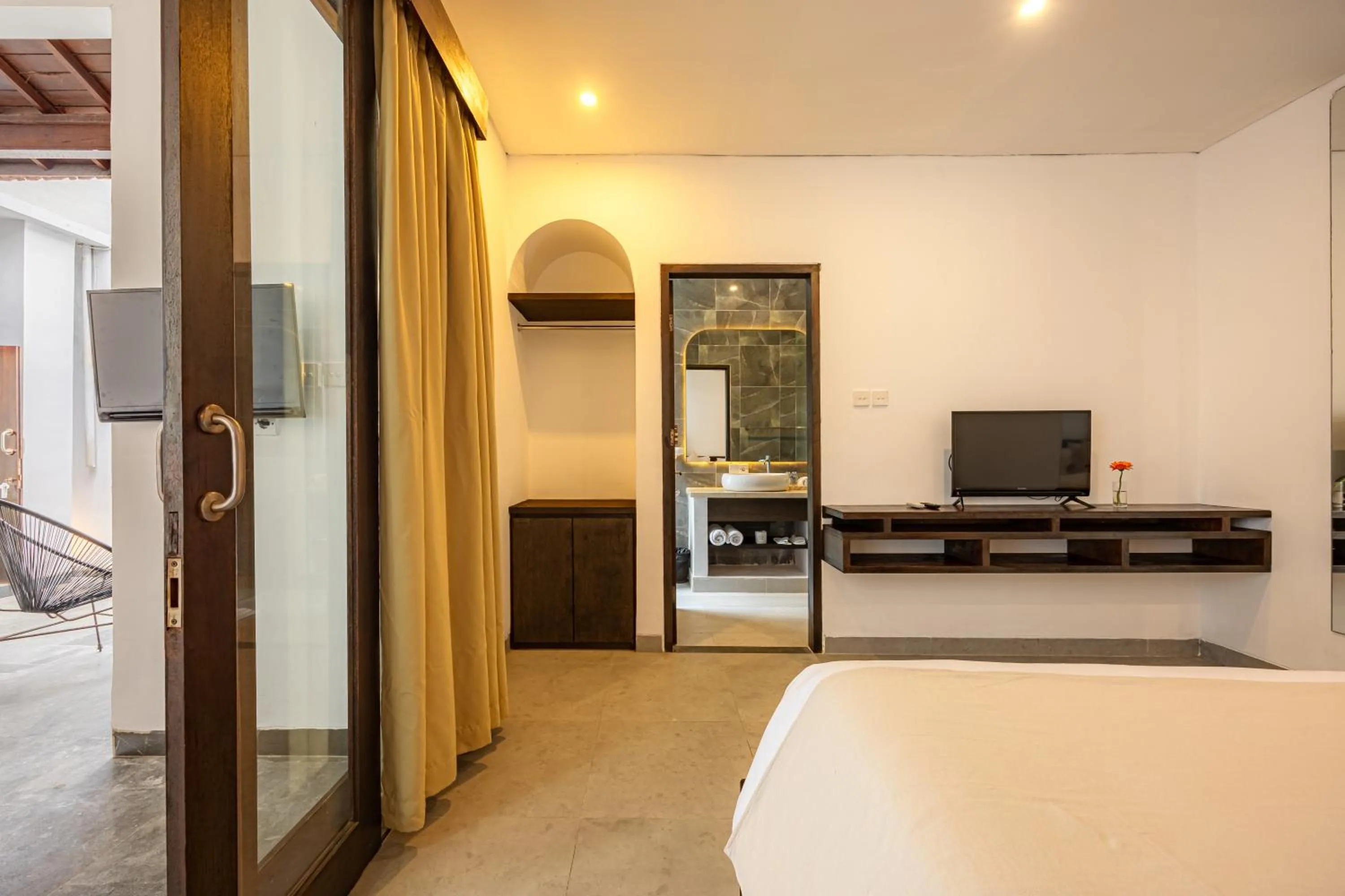 Bed in Apple Villa & Suite Seminyak