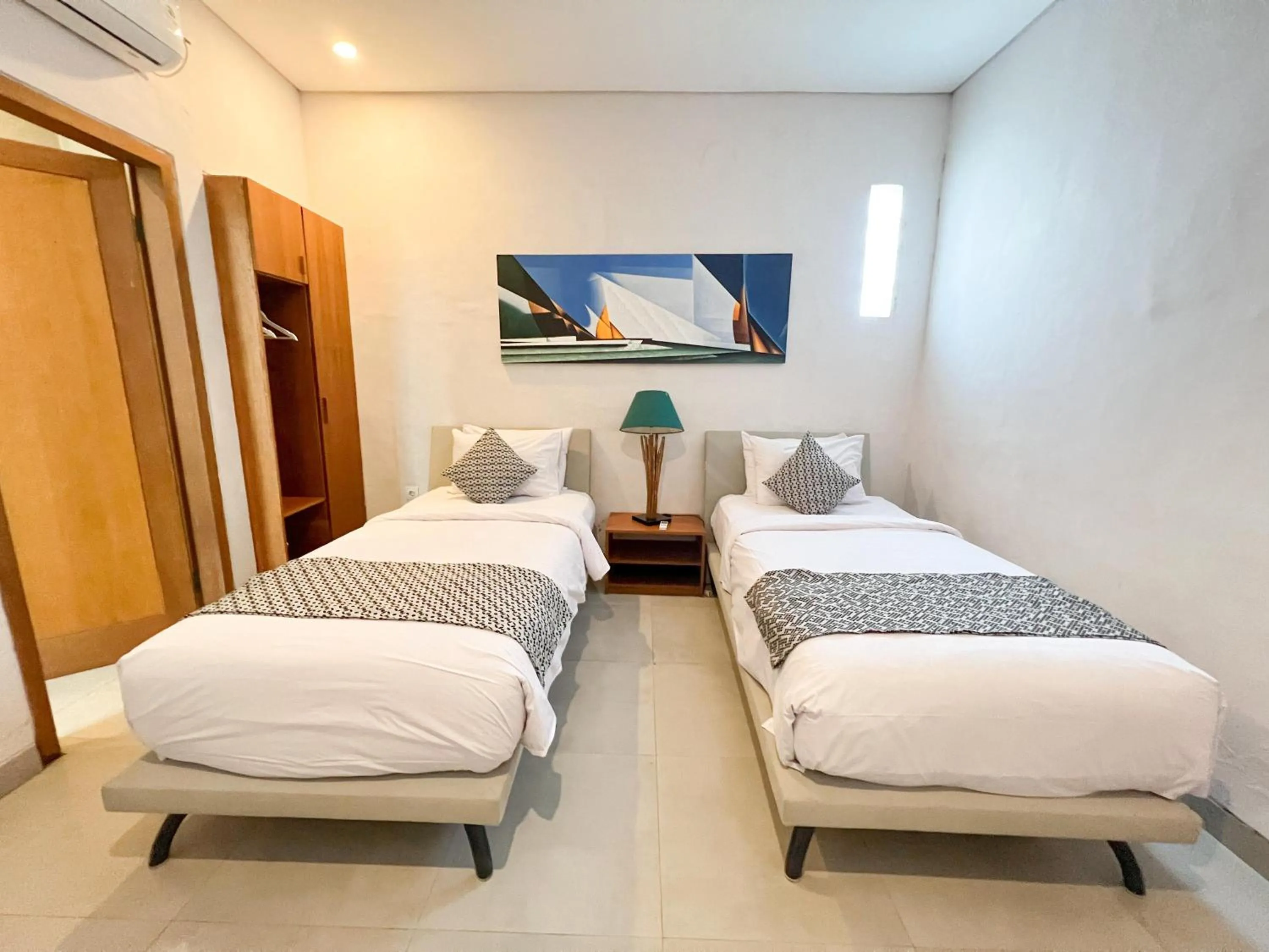 Bed in Apple Villa & Suite Seminyak