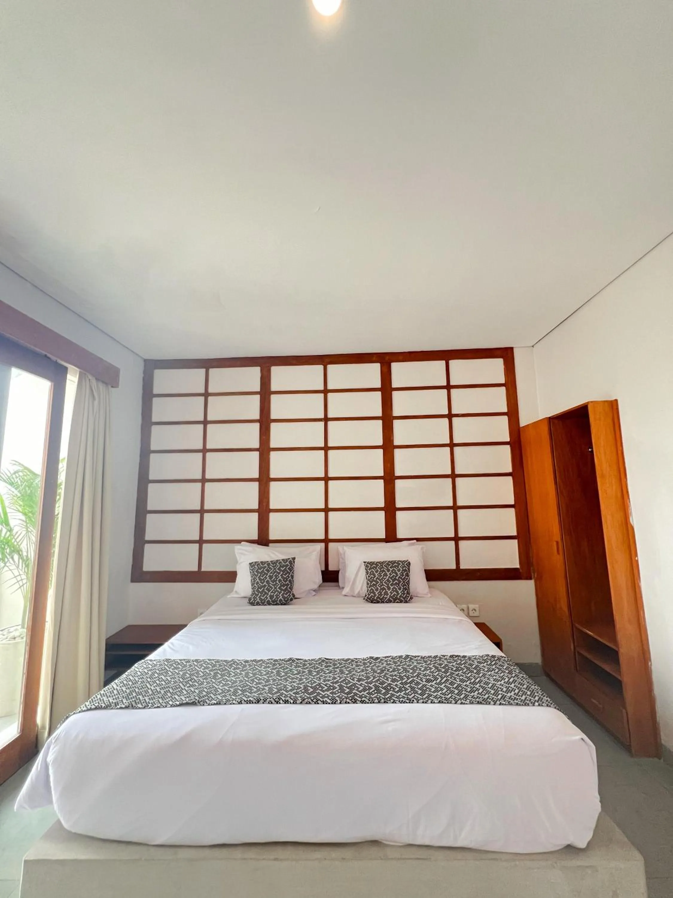 Bed in Apple Villa & Suite Seminyak