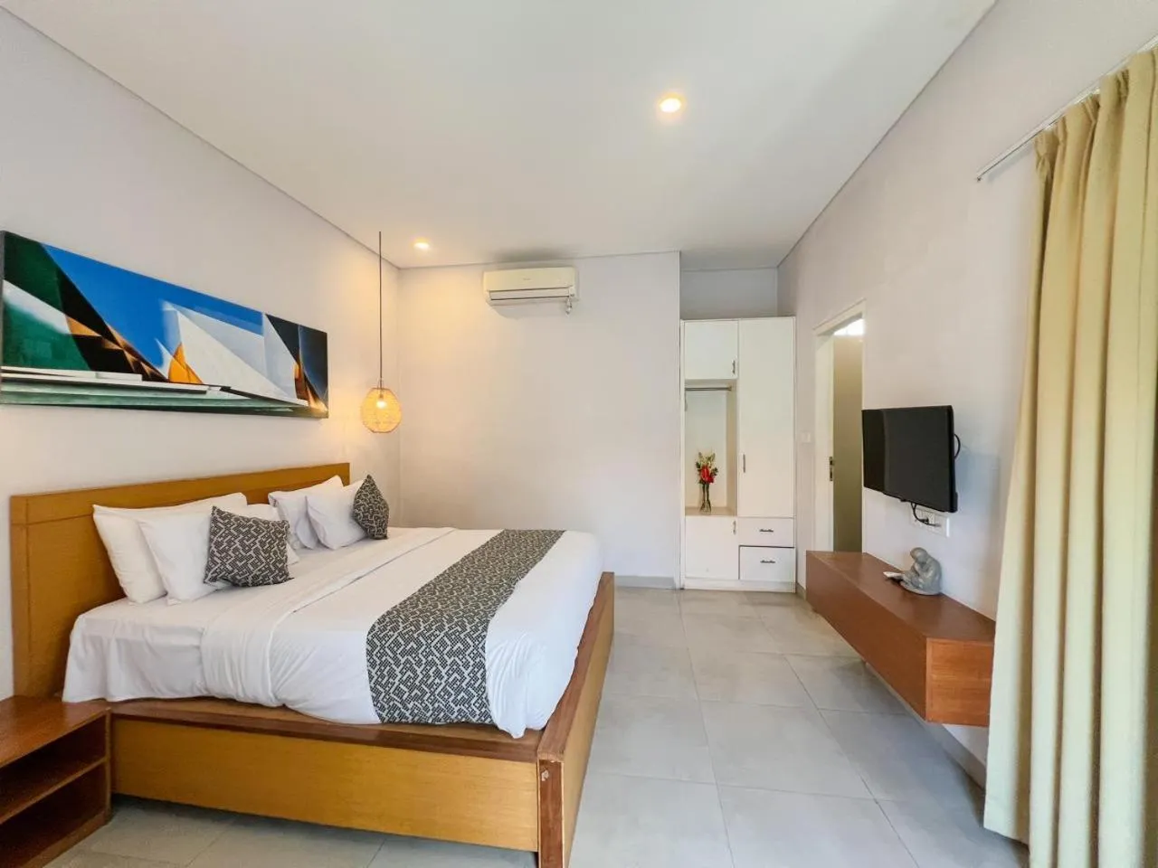 Bed in Apple Villa & Suite Seminyak