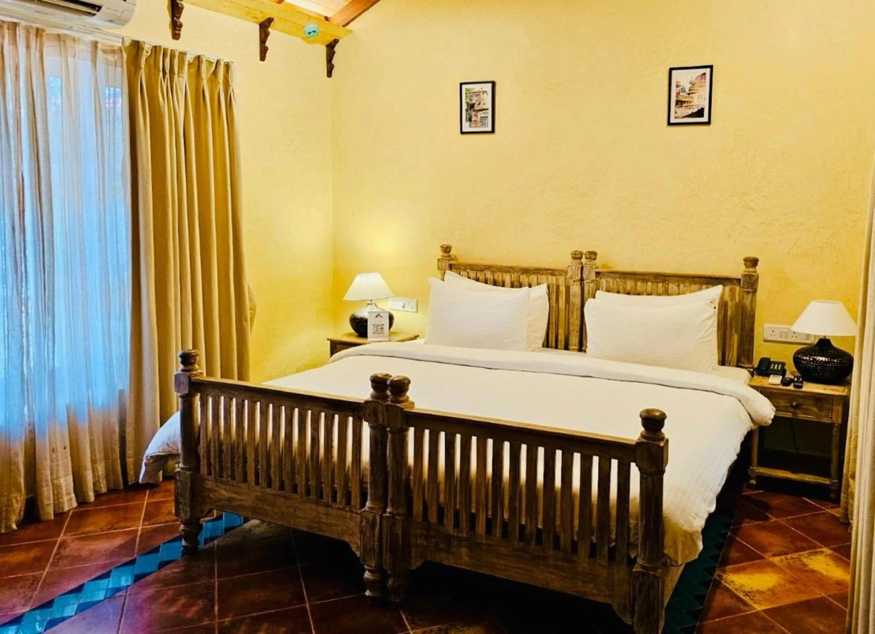 Bed in Amritara Aura Resort & Spa