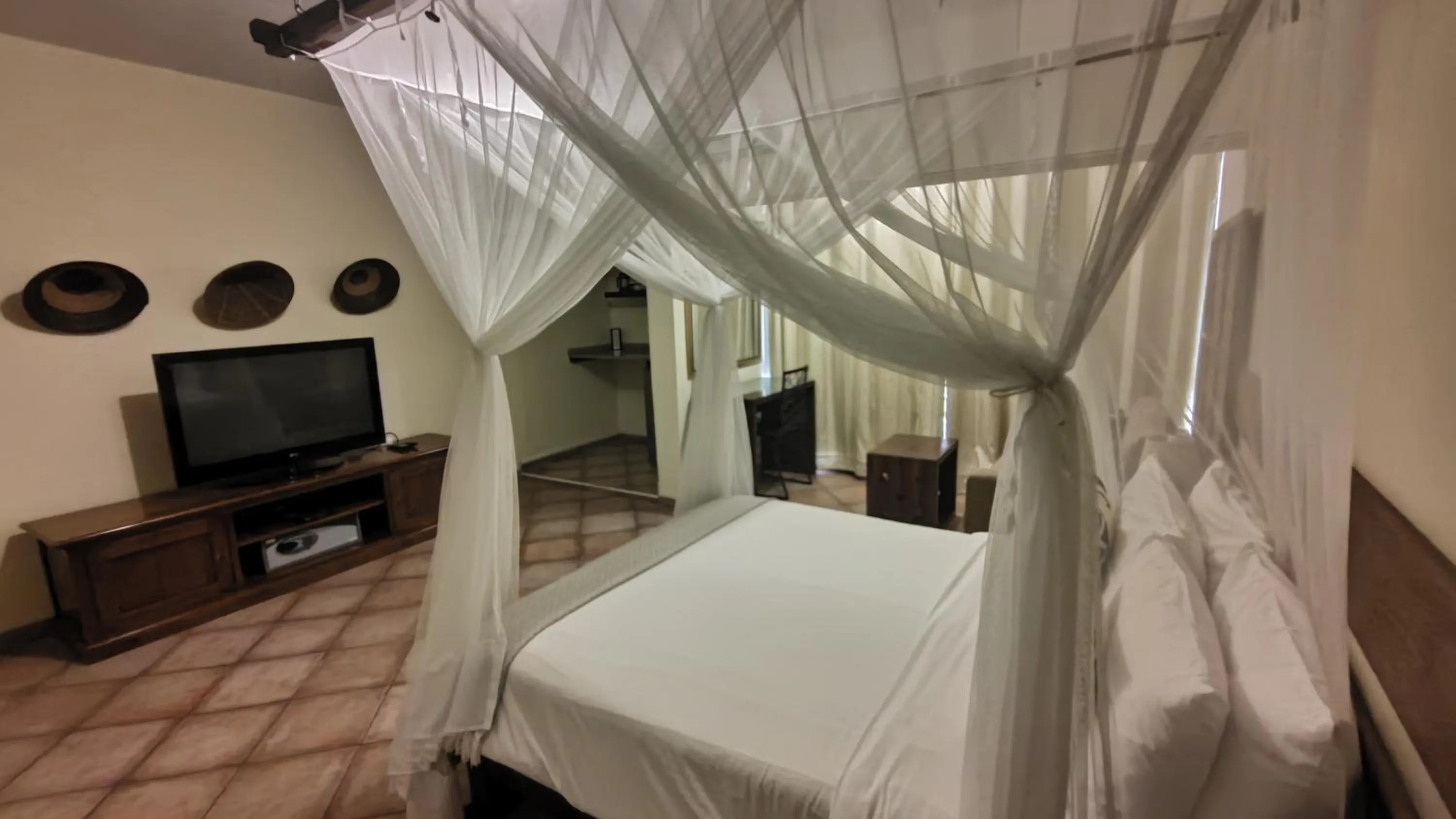 Bed in Sundown Guest House Maputo