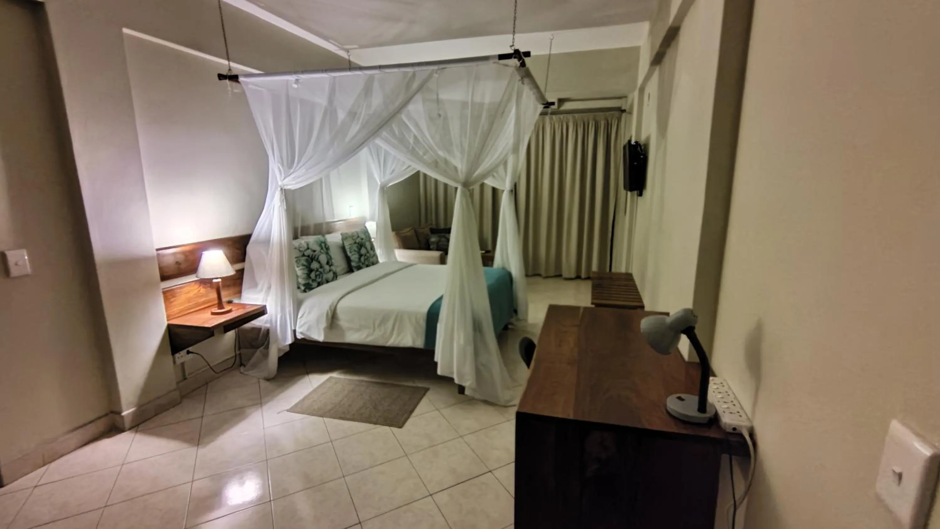 Bed in Sundown Guest House Maputo