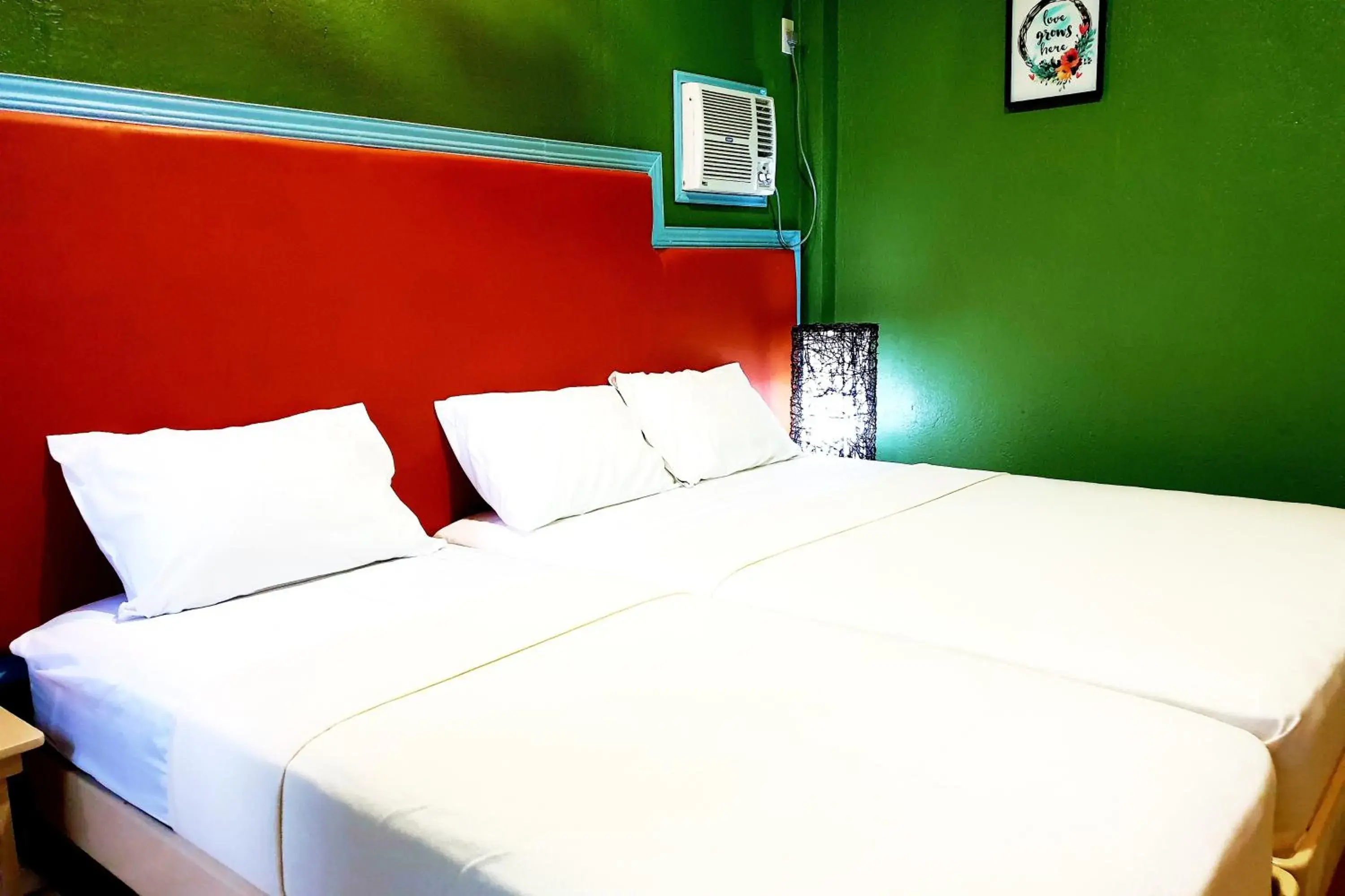 Deluxe Triple Room in MJs Garden Hotel Moalboal powered by Cocotel Deluxe Triple Room in MJs Garden Hotel Moalboal powered by Cocotel