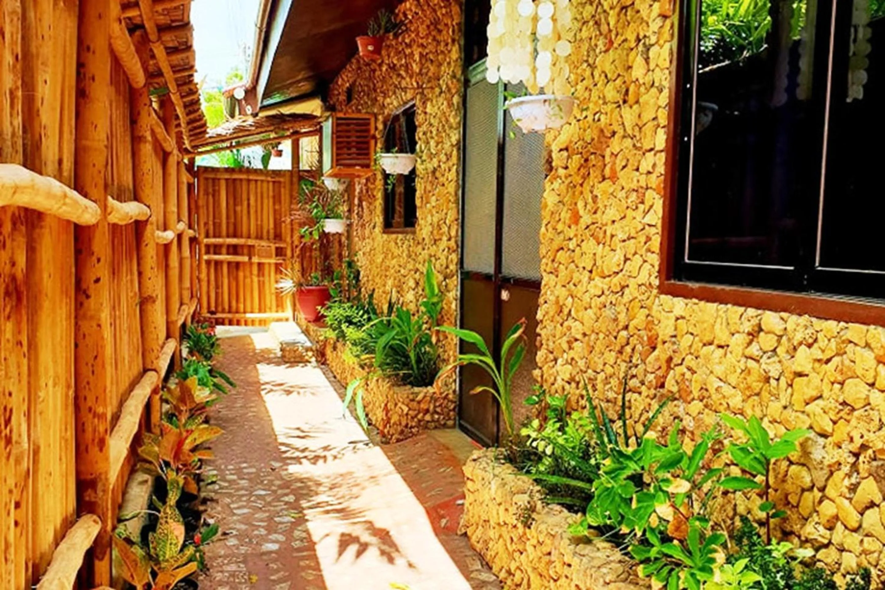 Property building in MJs Garden Hotel Moalboal powered by Cocotel