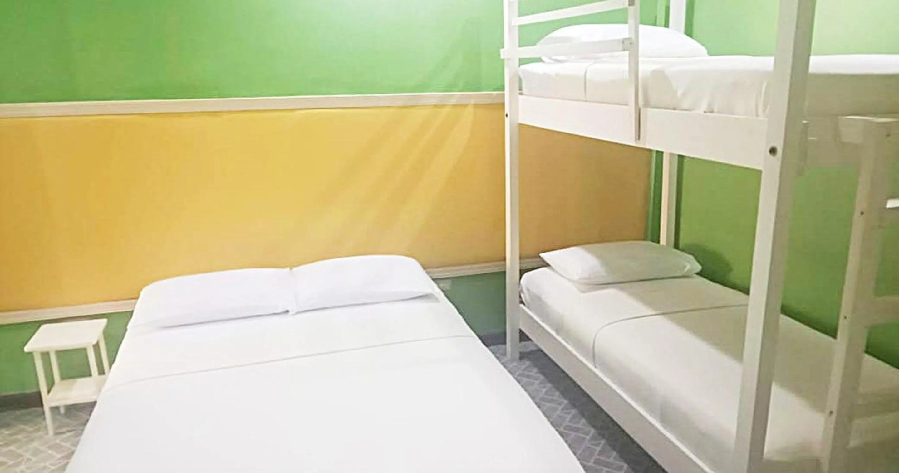 Bed in MJs Garden Hotel Moalboal powered by Cocotel