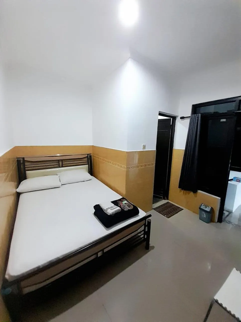 Bed in Hotel Srikandi Baru