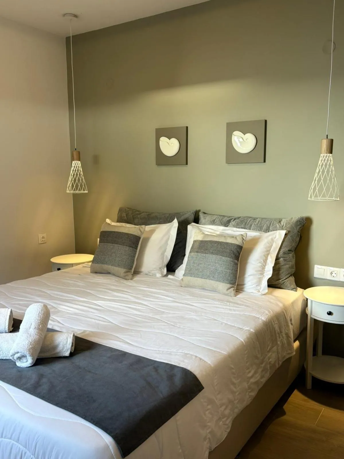 Bed in Vicky's Panoramic View Apartments