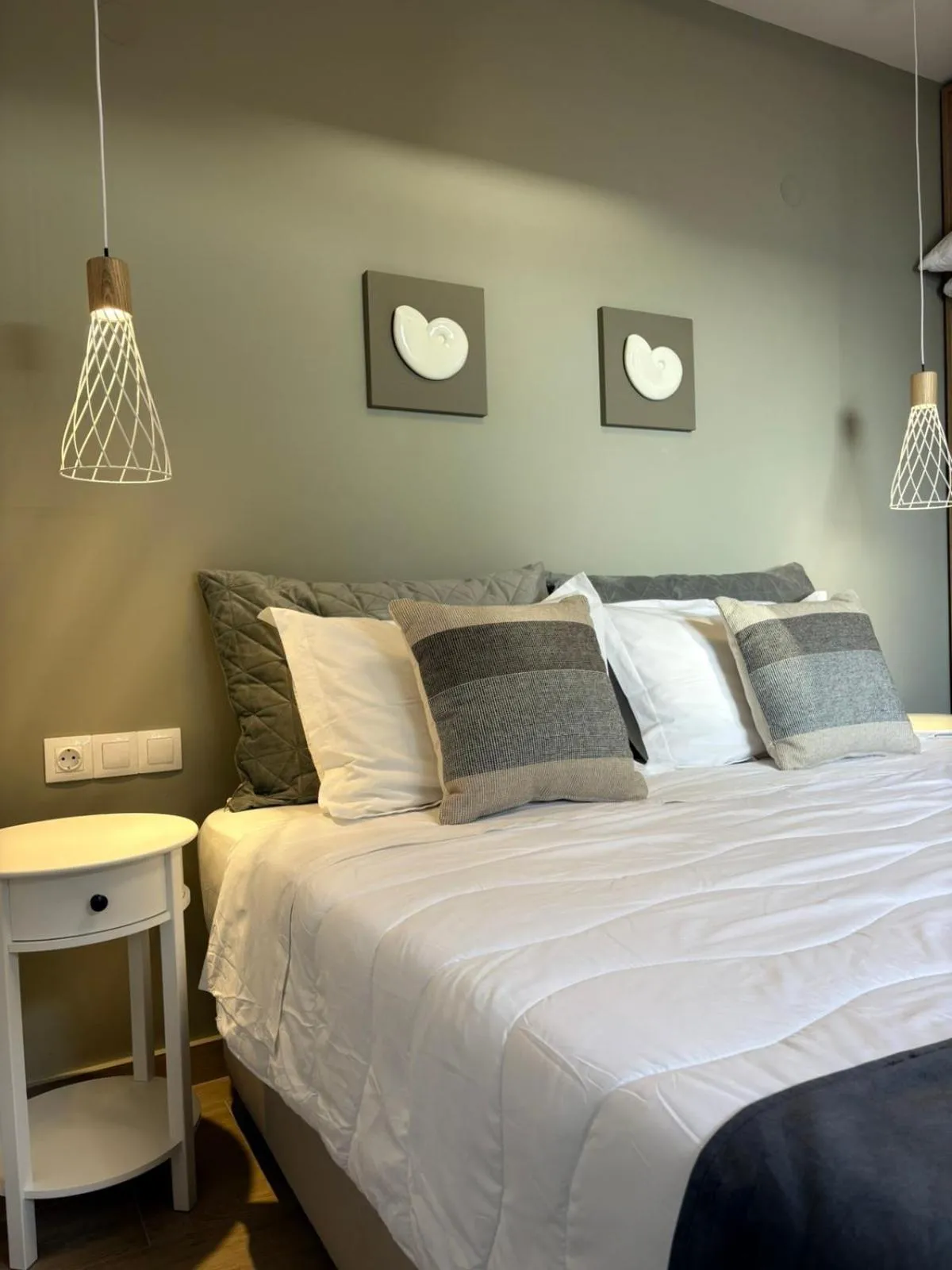 Bed in Vicky's Panoramic View Apartments