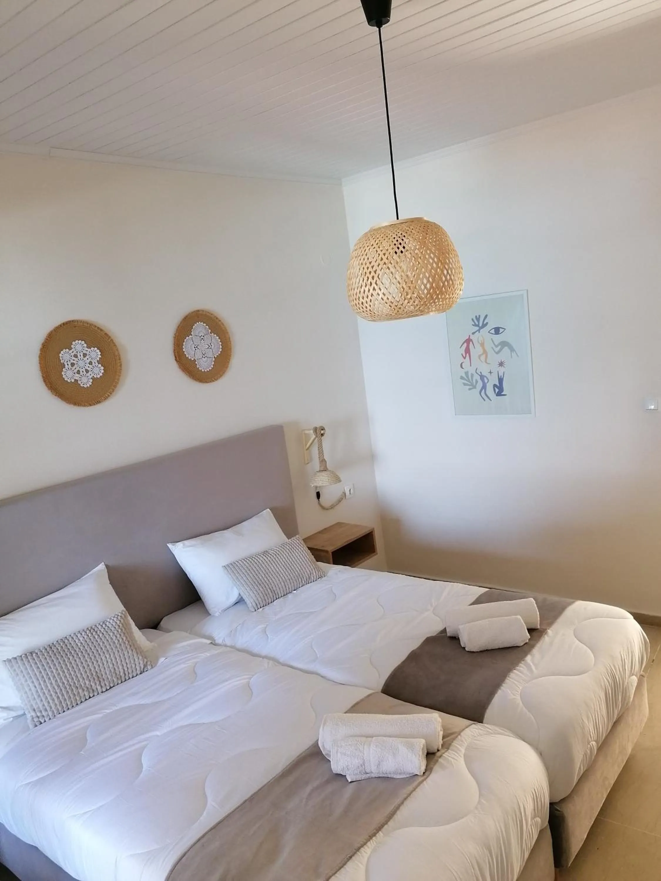 Bed in Vicky's Panoramic View Apartments