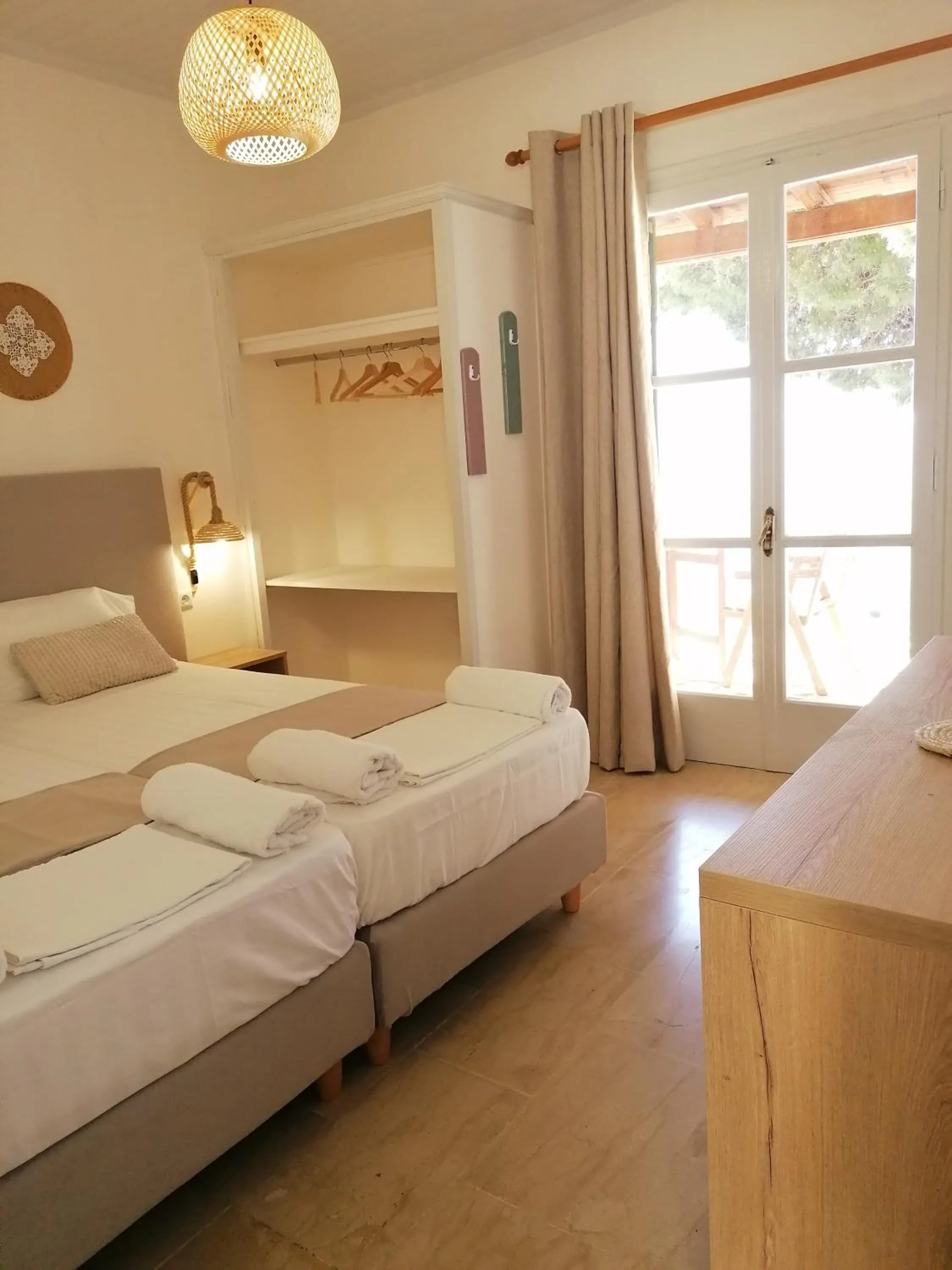Bed in Vicky's Panoramic View Apartments