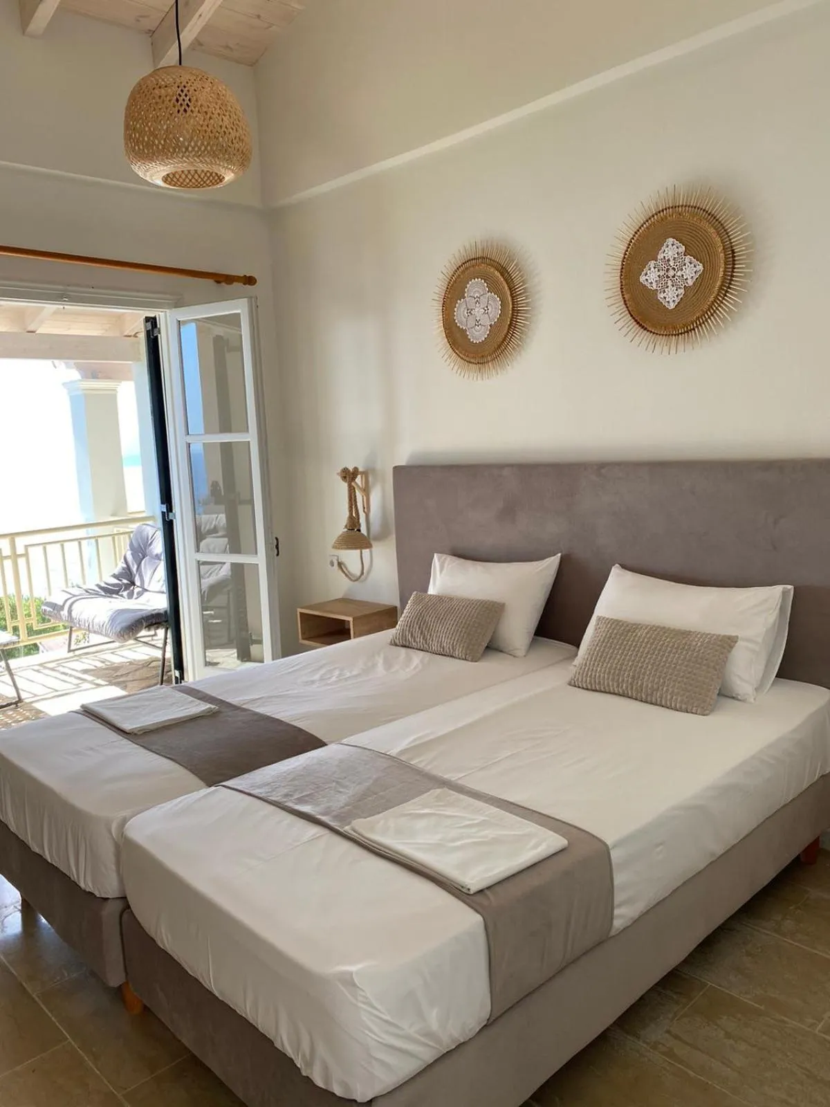 Bed in Vicky's Panoramic View Apartments