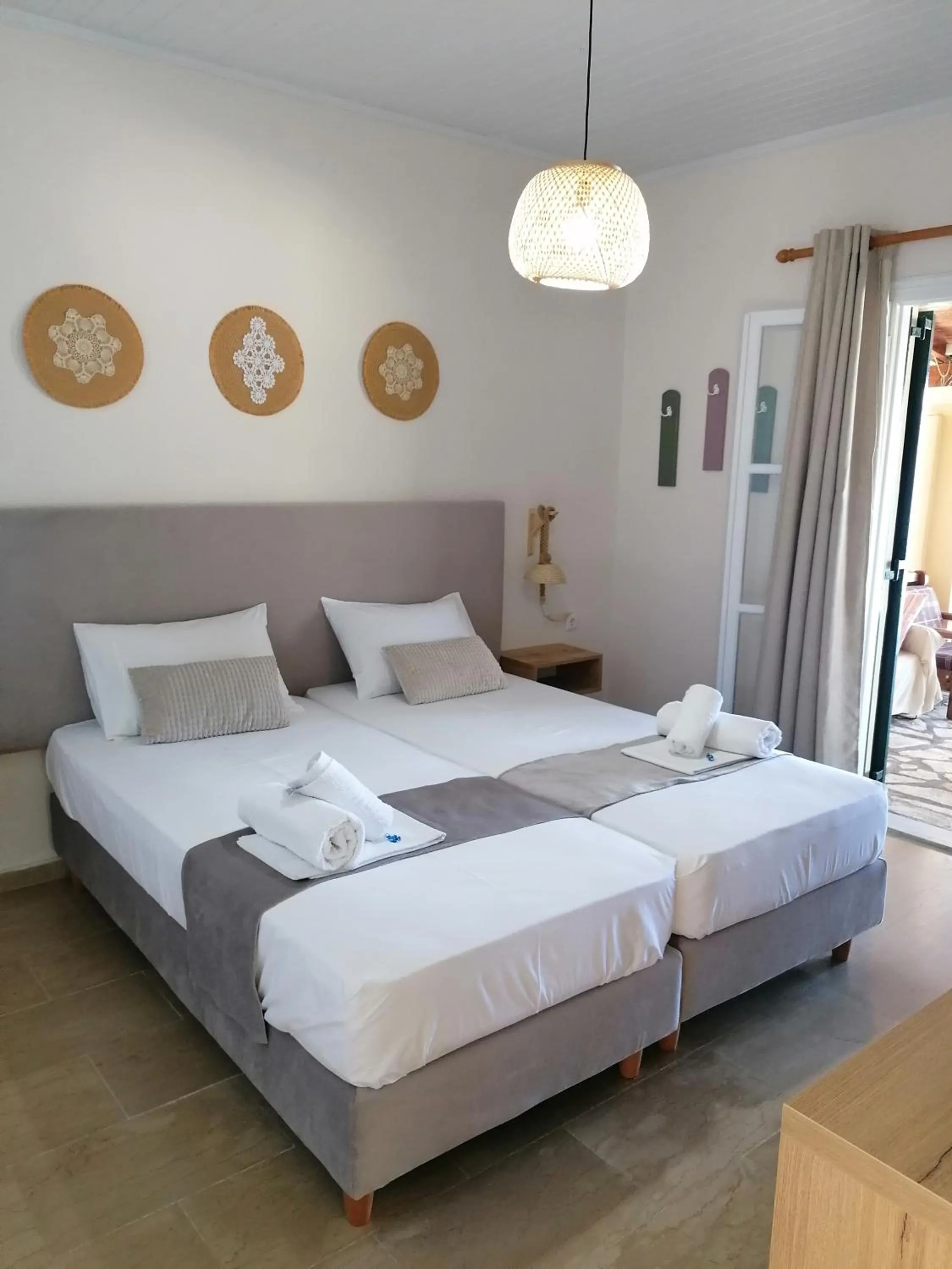 Bed in Vicky's Panoramic View Apartments
